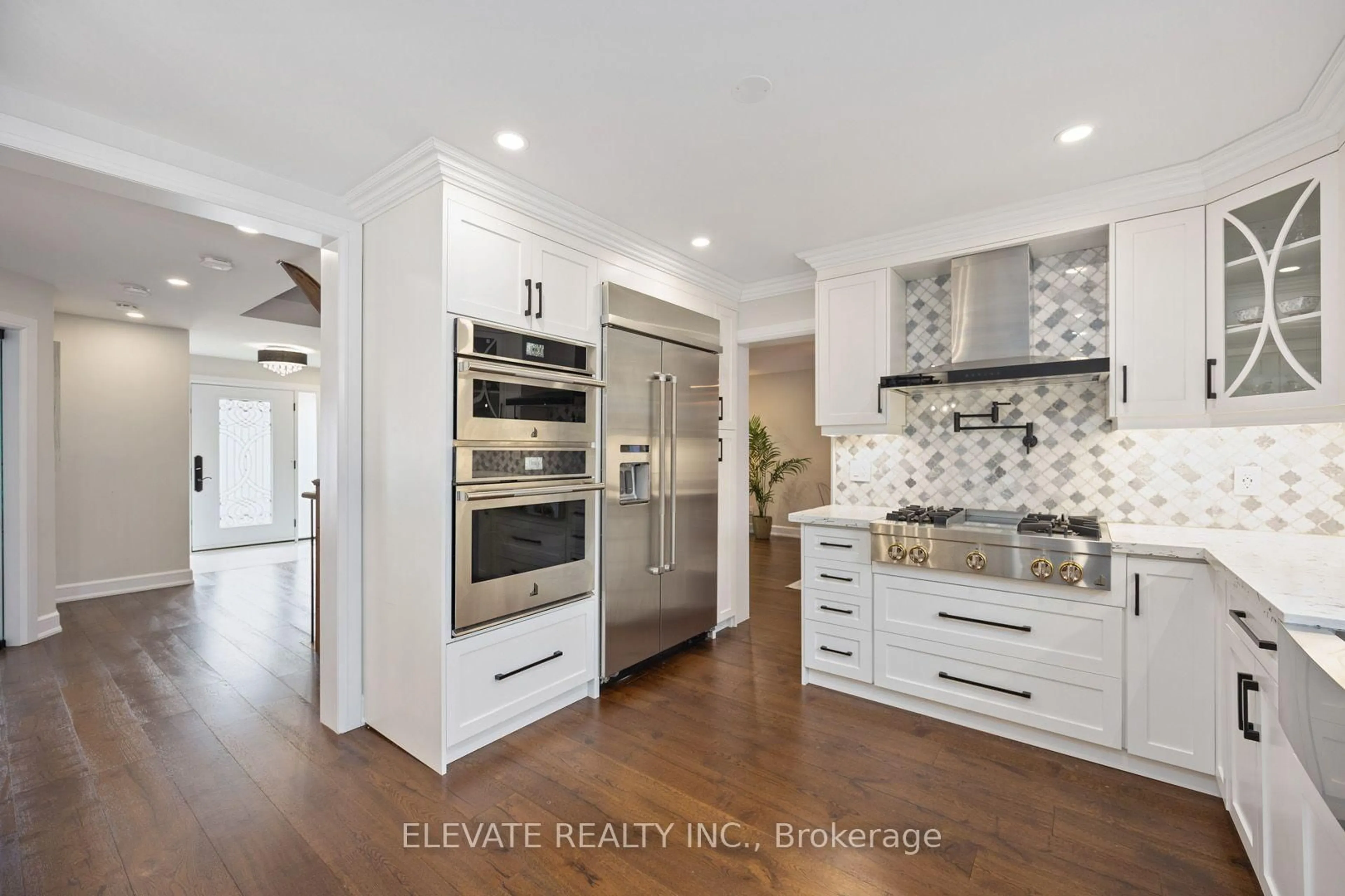 Open concept kitchen, ceramic/tile floor for 2059 Shawanaga Tr, Mississauga Ontario L5H 3Z3