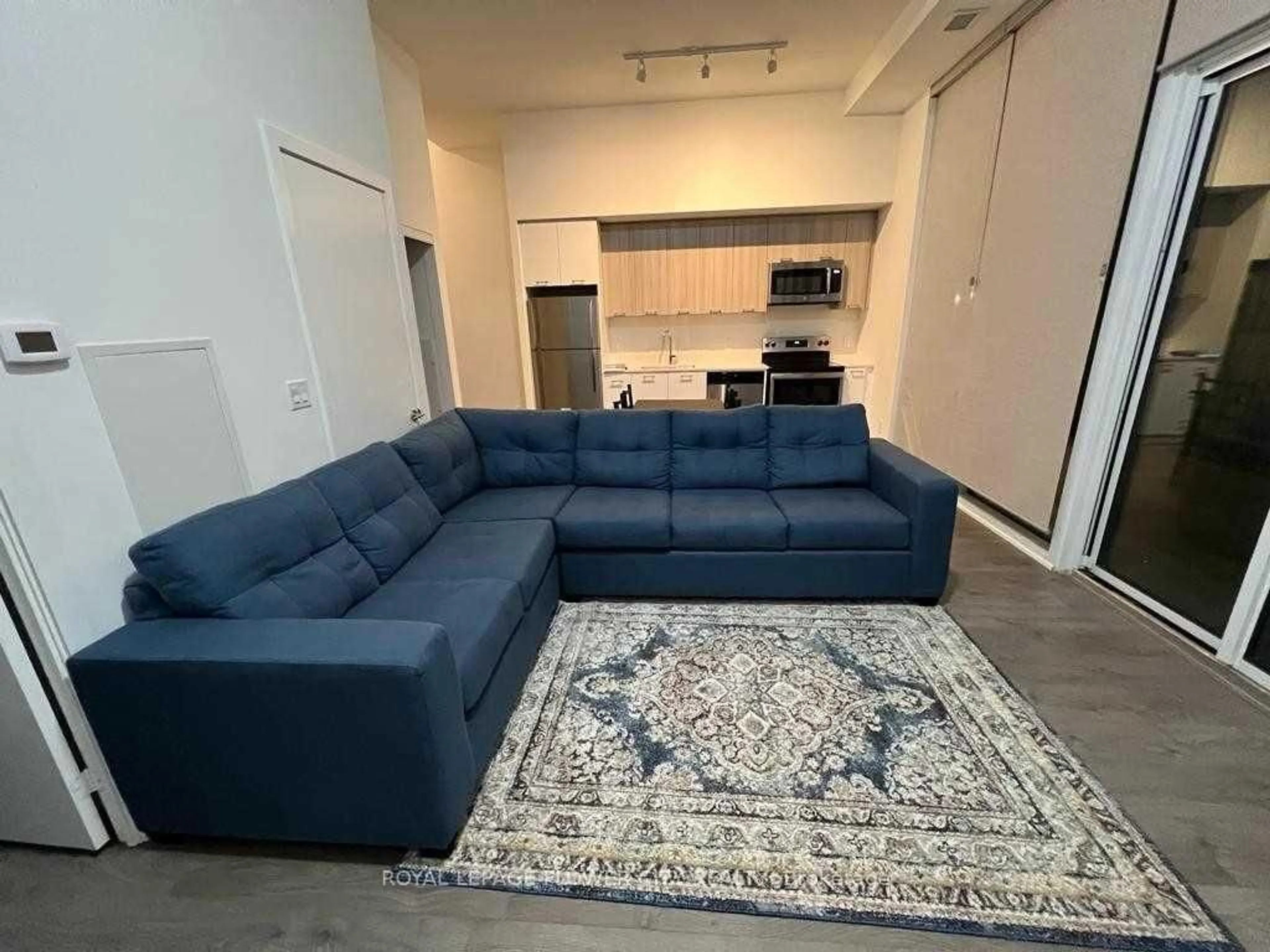 Living room with furniture, unknown for 180 Veterans Dr #103, Brampton Ontario L6X 5R6