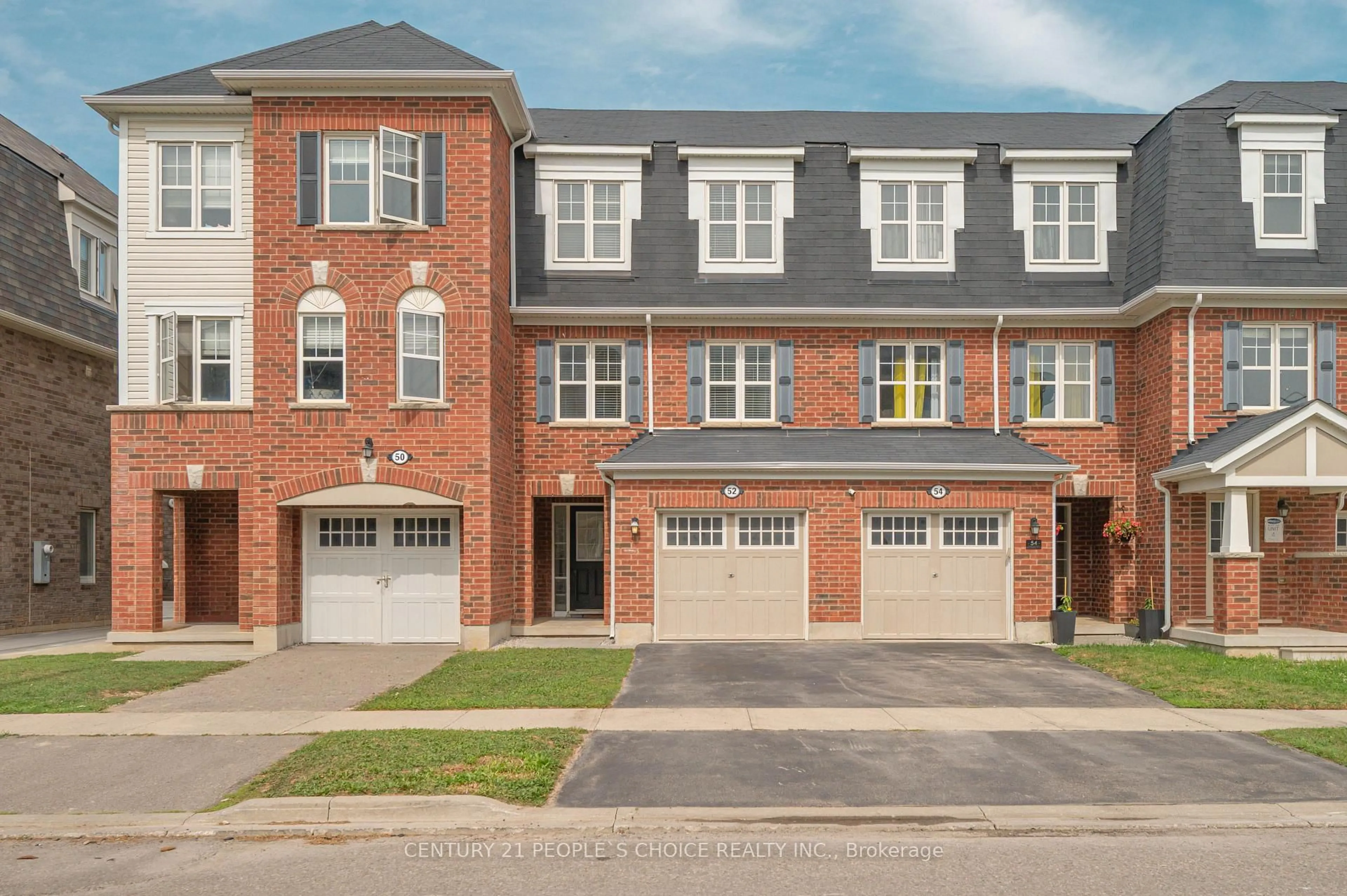 Home with brick exterior material, street for 52 Stewardship Rd, Brampton Ontario L7A 4W6