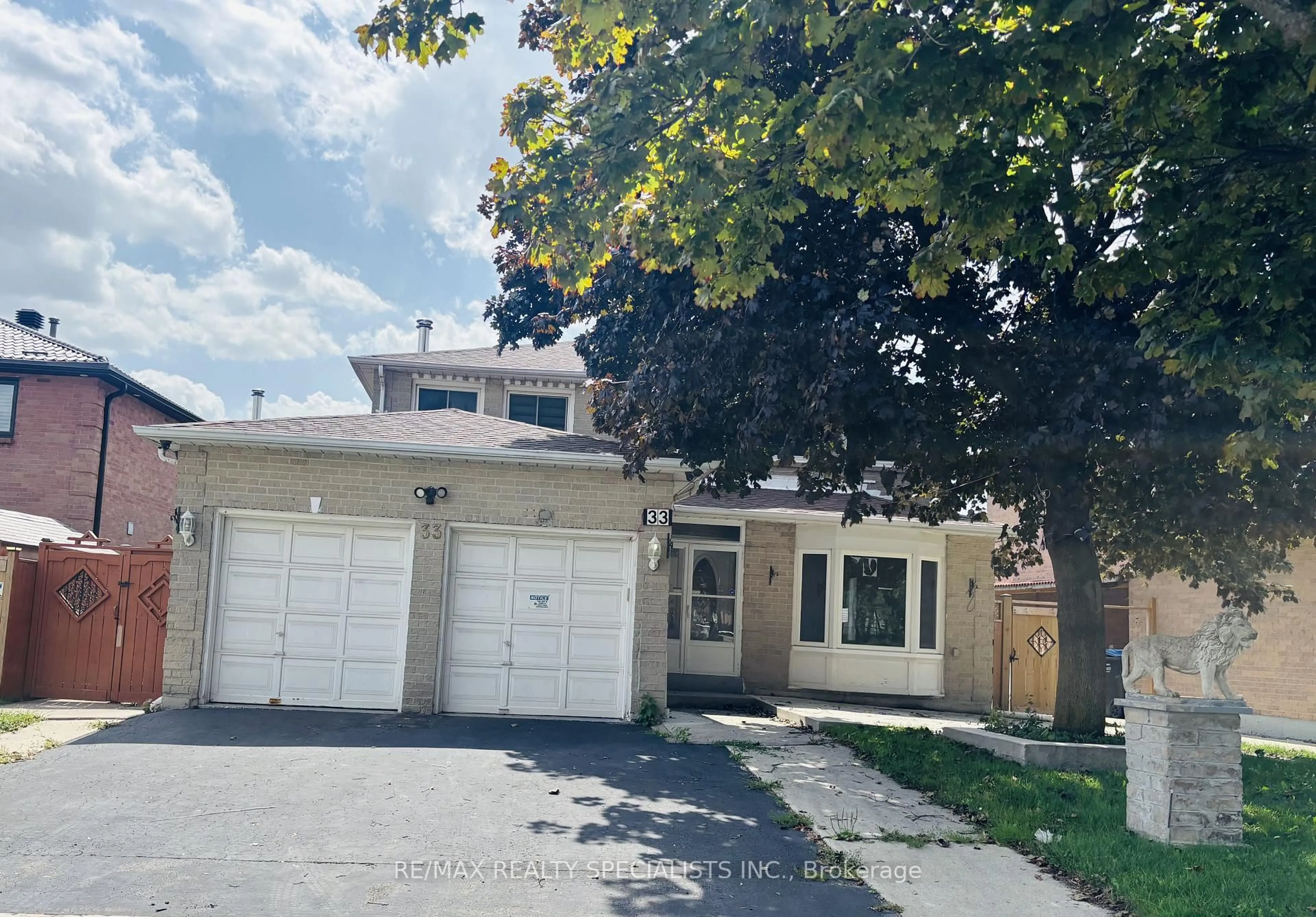 Home with vinyl exterior material, street for 33 Cherrytree Dr, Brampton Ontario L6Y 3L7