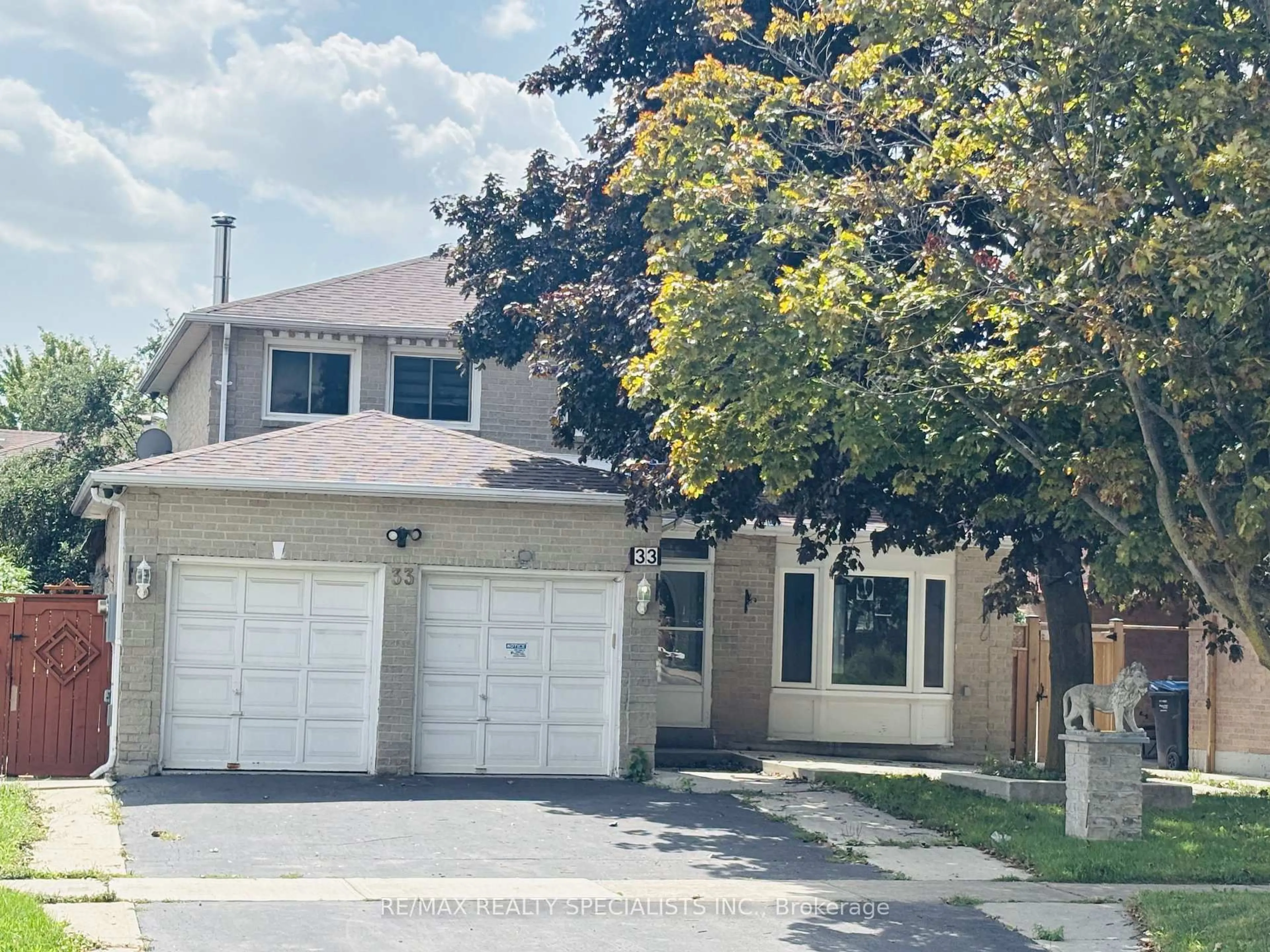 Home with vinyl exterior material, street for 33 Cherrytree Dr, Brampton Ontario L6Y 3L7