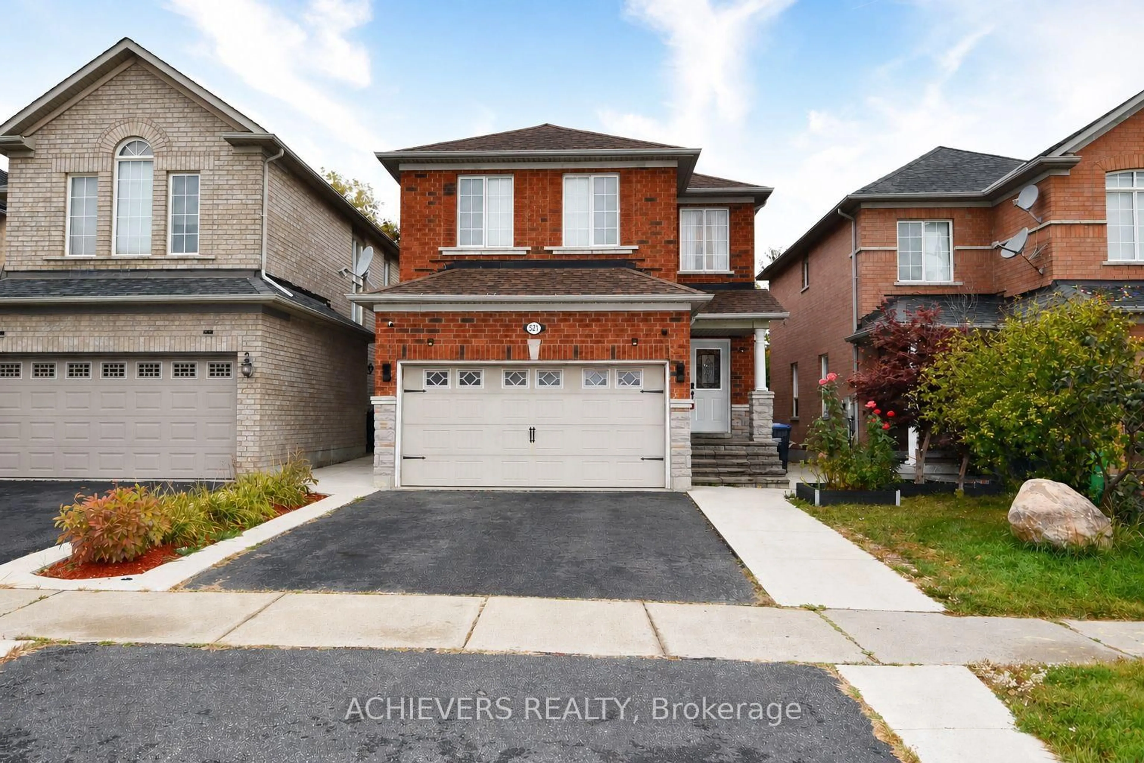 Home with brick exterior material, street for 521 Navigator Dr, Mississauga Ontario L5W 1P5