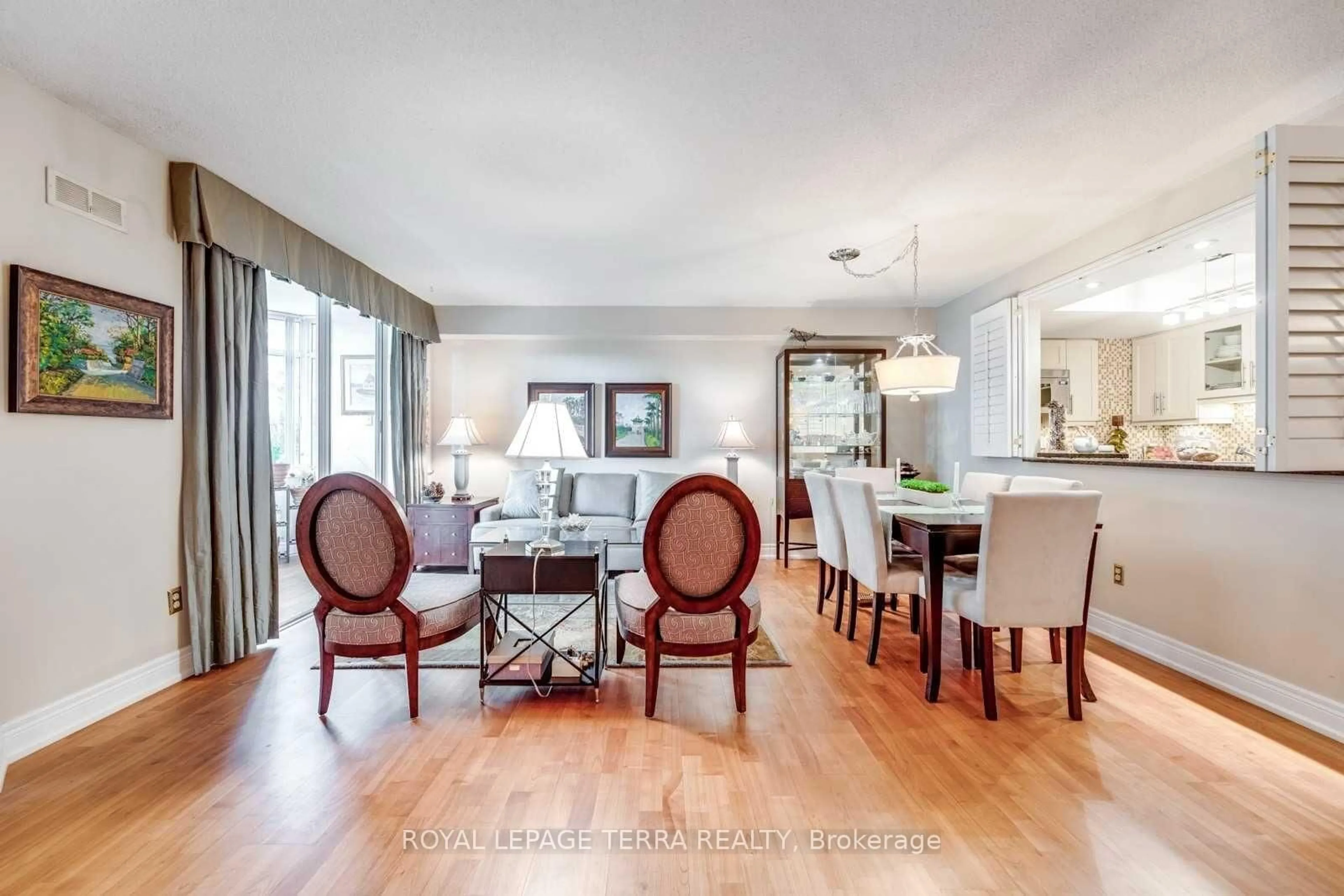 Dining room, wood/laminate floor for 300 Webb Dr #201, Mississauga Ontario L5B 3W3