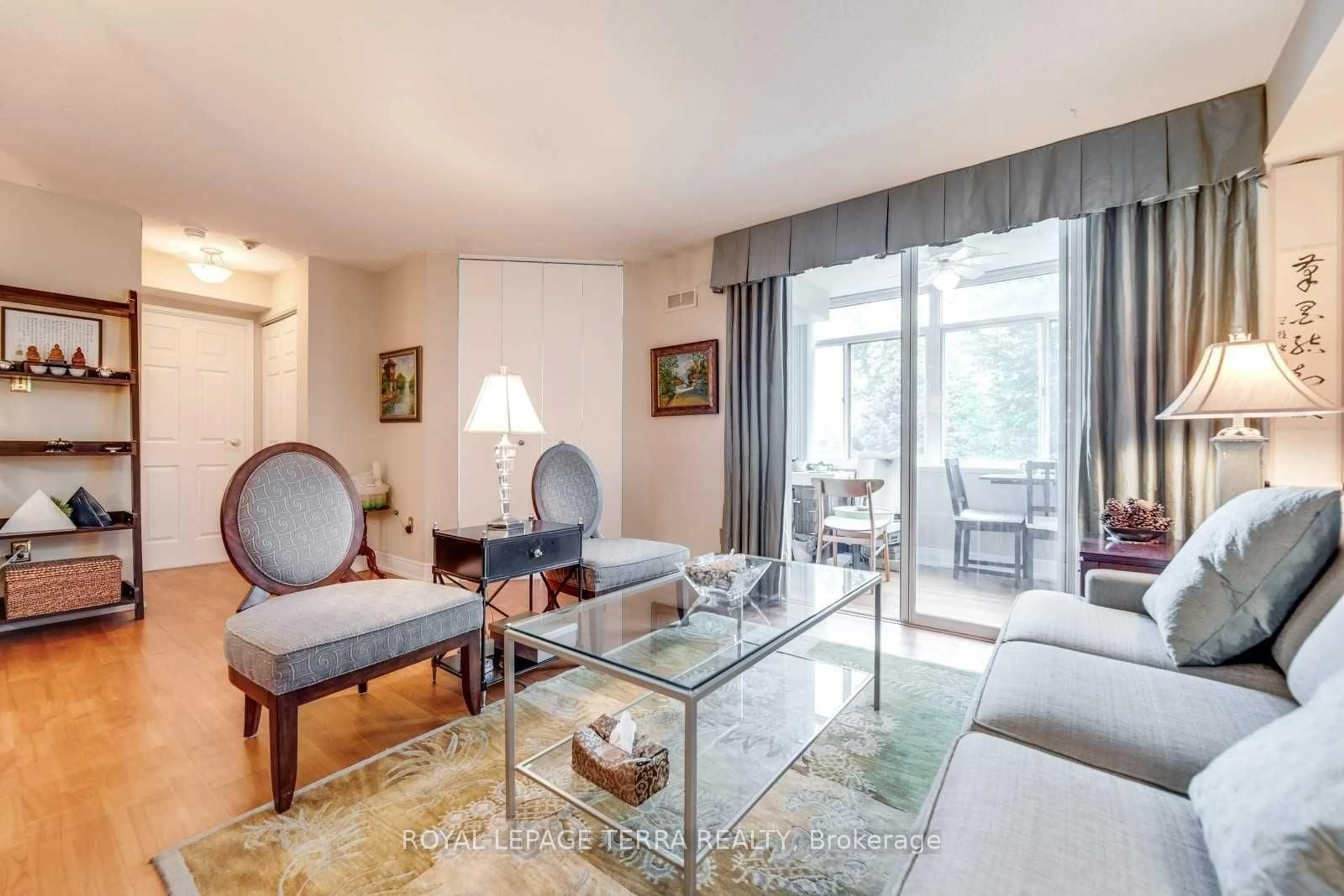 Living room with furniture, unknown for 300 Webb Dr #201, Mississauga Ontario L5B 3W3