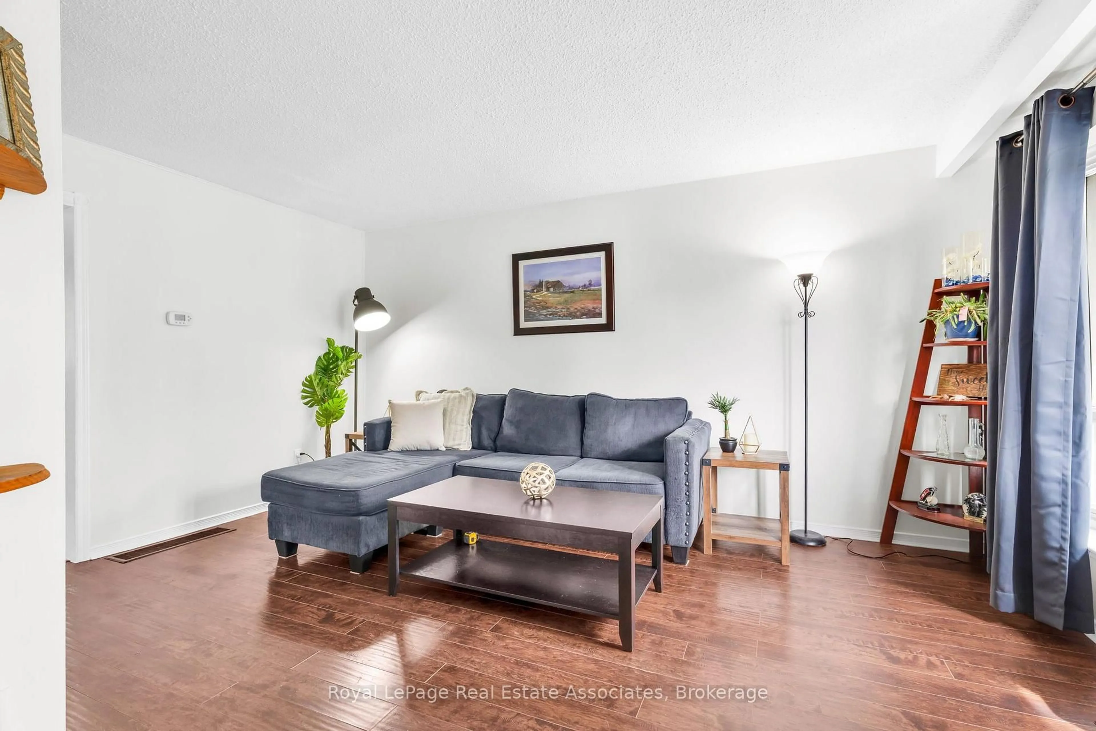 Living room with furniture, unknown for 81 Glenmore Cres, Brampton Ontario L6S 1H9