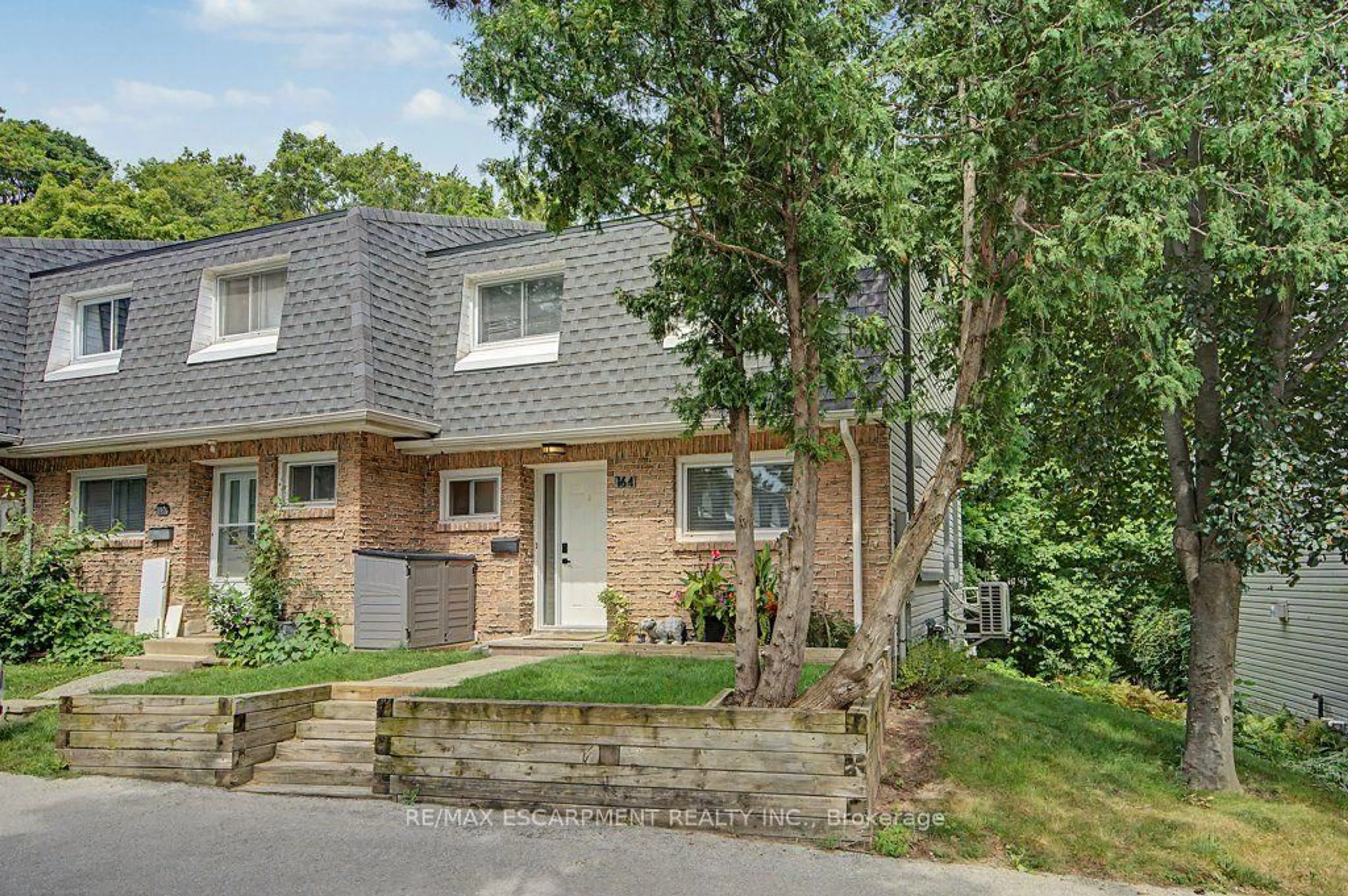 Home with brick exterior material, street for 2050 Upper Middle Rd #164, Burlington Ontario L7P 3R9