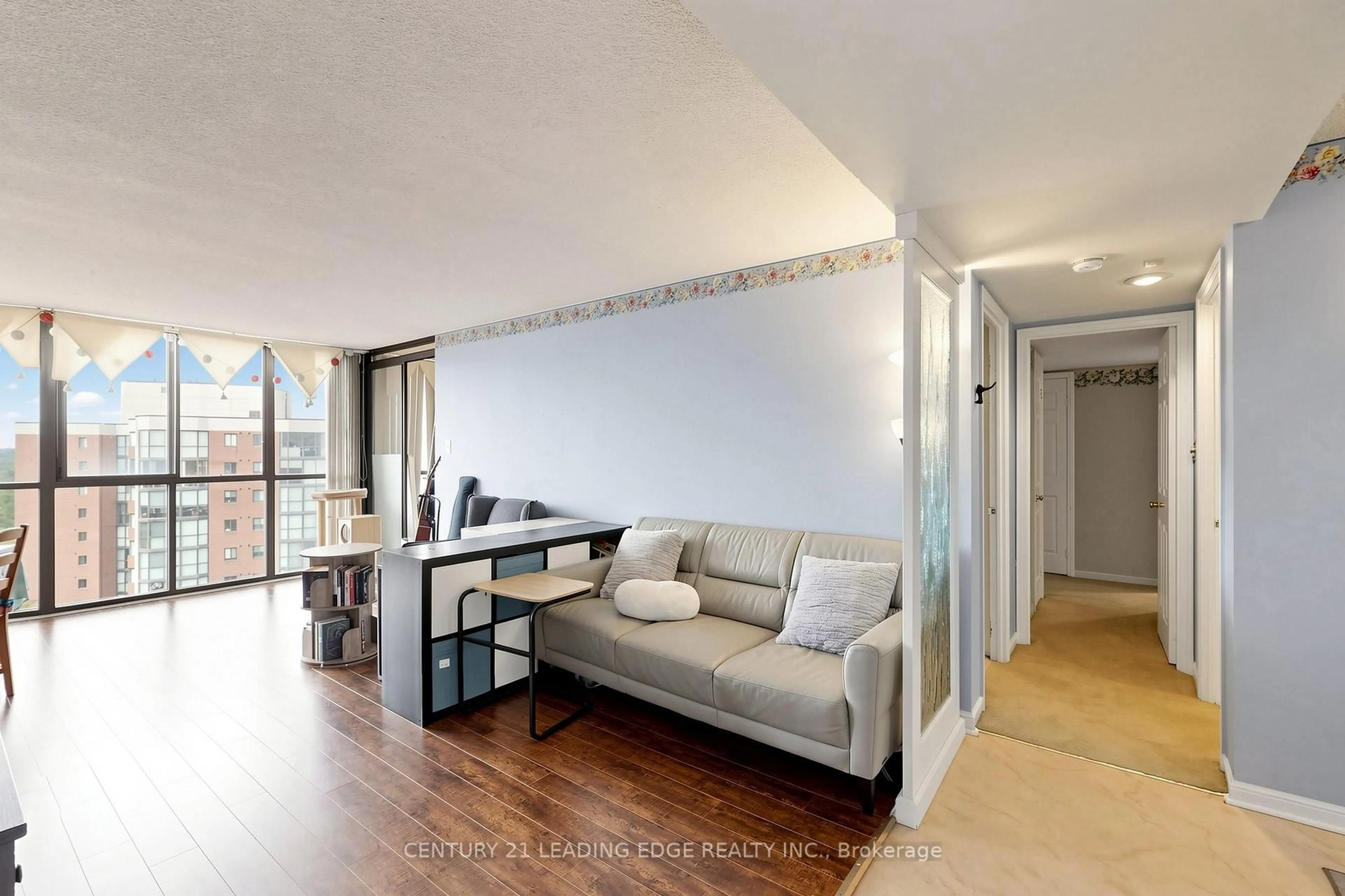 Living room with furniture, unknown for 1230 Marlborough Crt #1106, Oakville Ontario L6H 3K6