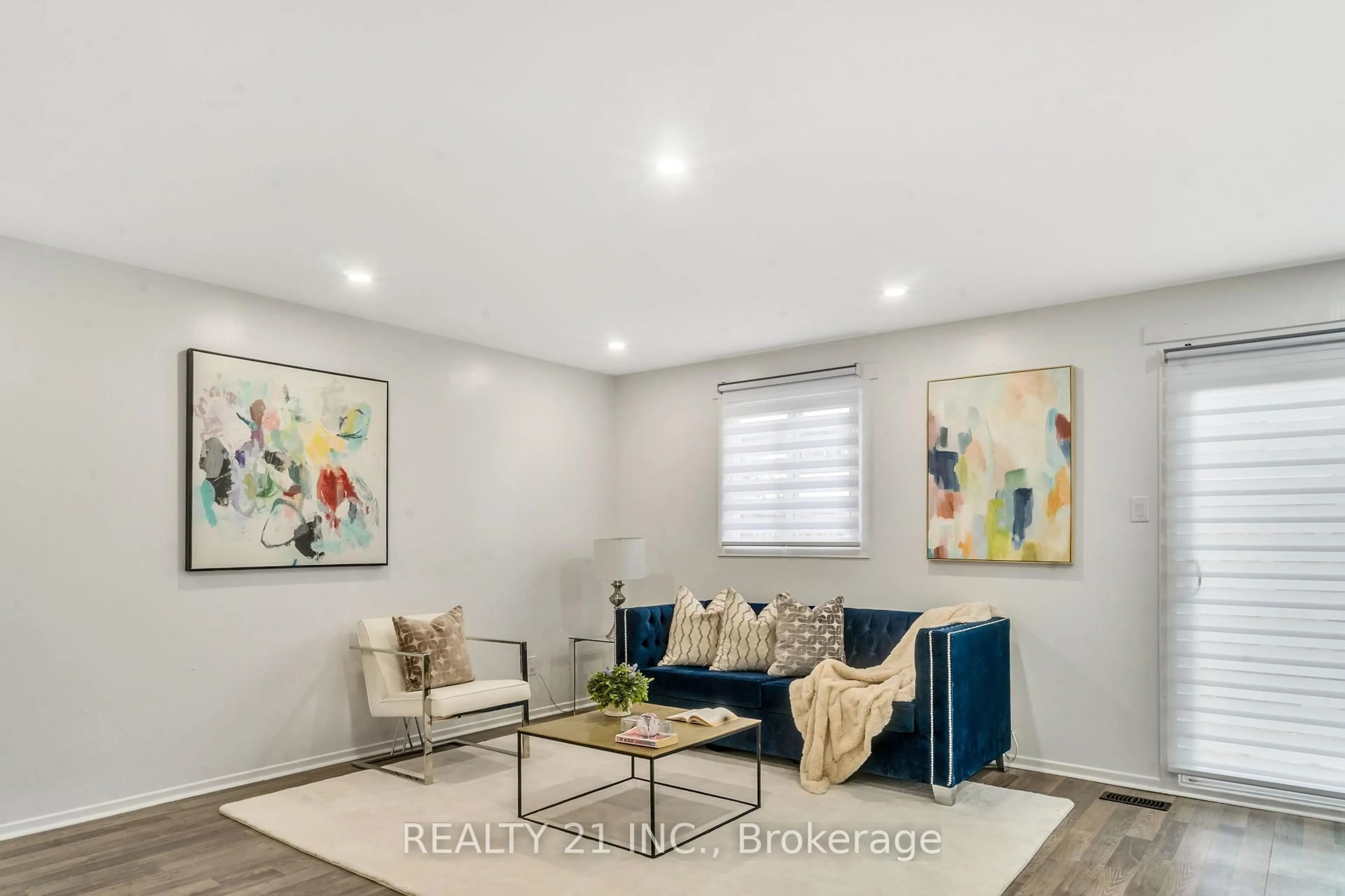 Living room with furniture, unknown for 45 Hansen Rd #101, Brampton Ontario L6V 3C5