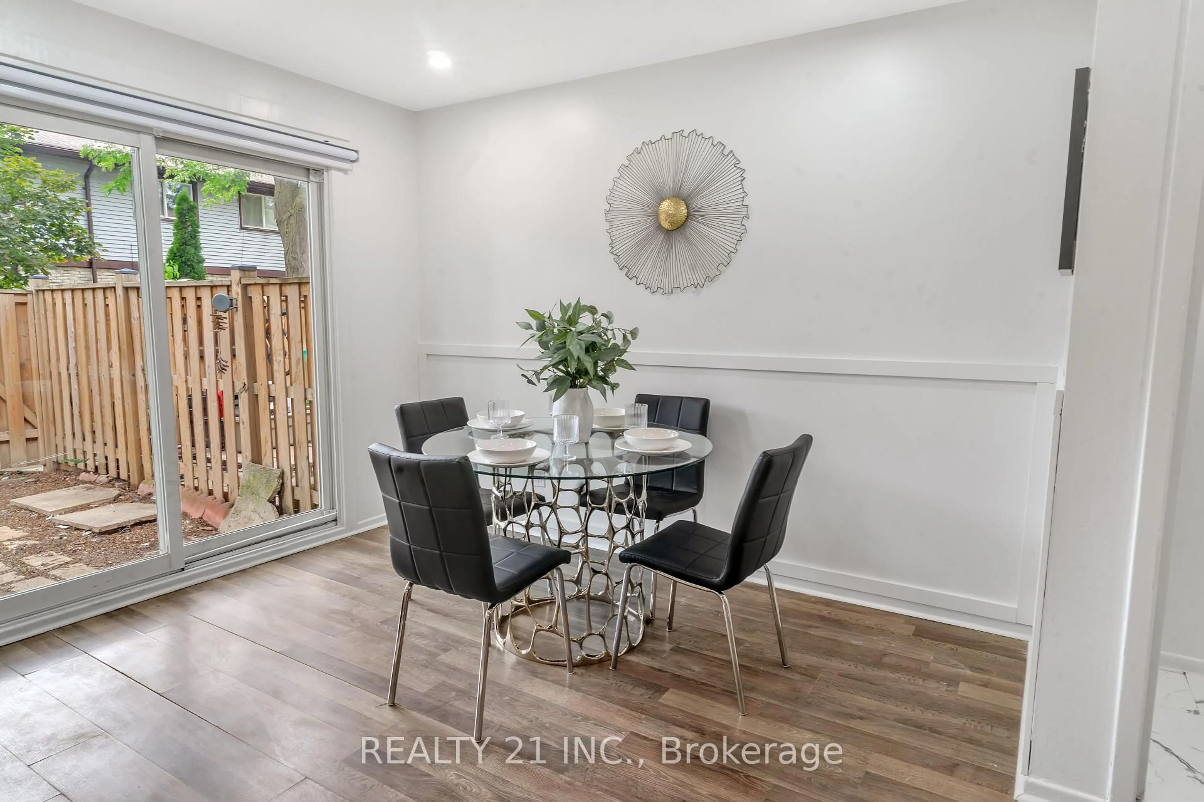 Dining room, wood/laminate floor for 45 Hansen Rd #101, Brampton Ontario L6V 3C5
