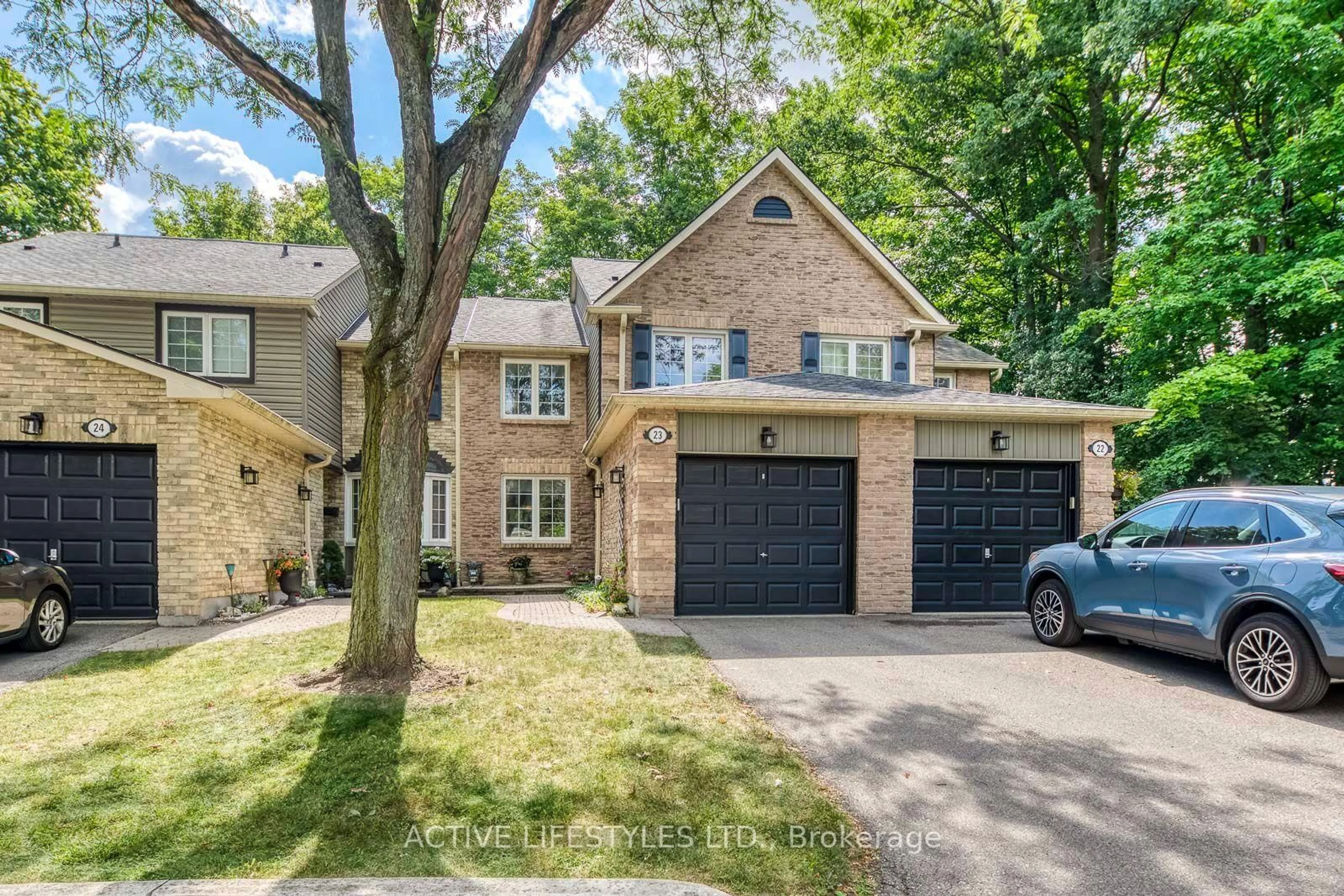 Home with brick exterior material, street for 2766 Folkway Dr #23, Mississauga Ontario L5L 3M3