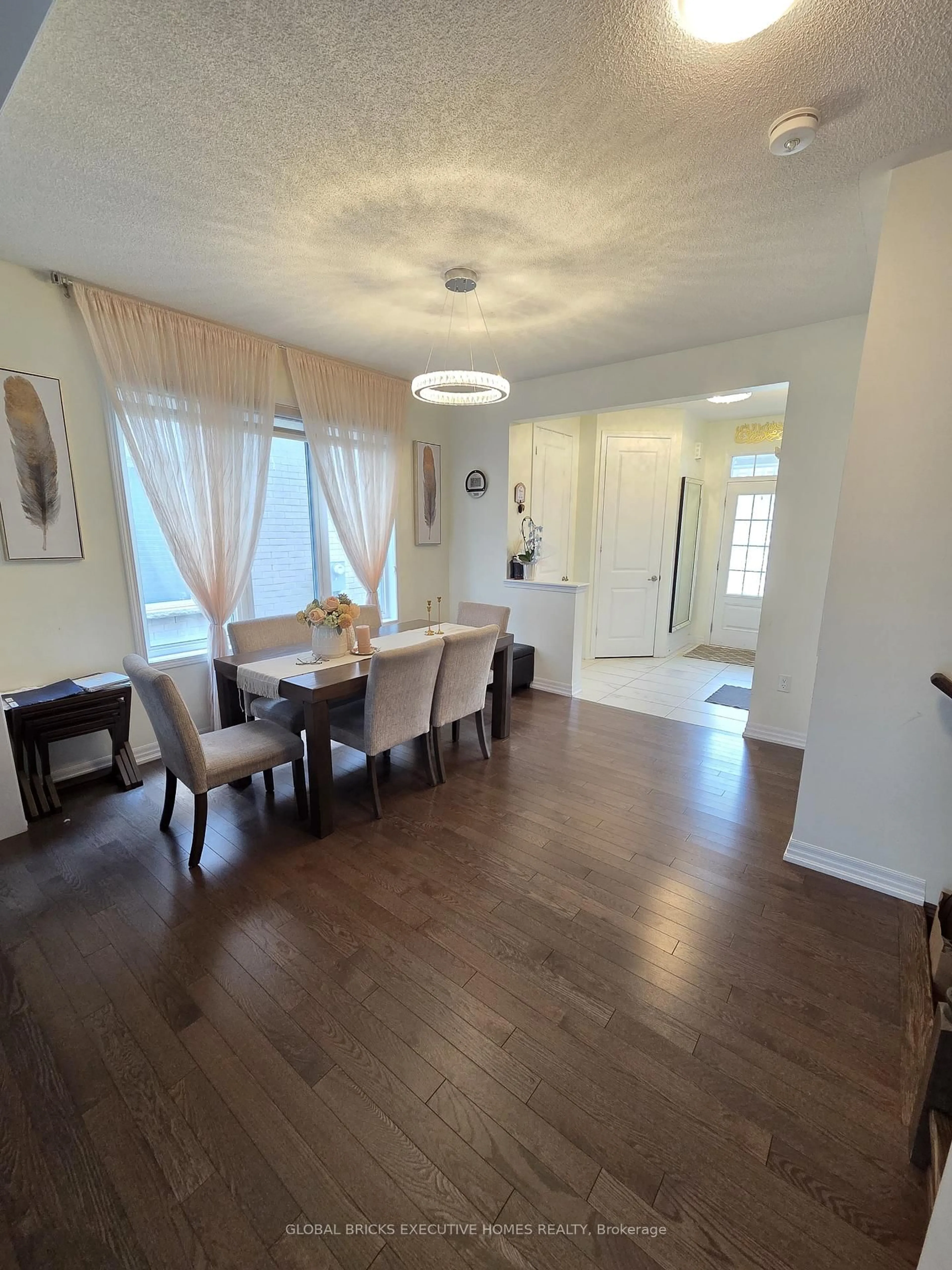 Dining room, wood/laminate floor for 3461 Eternity Way, Oakville Ontario L6H 0Y2