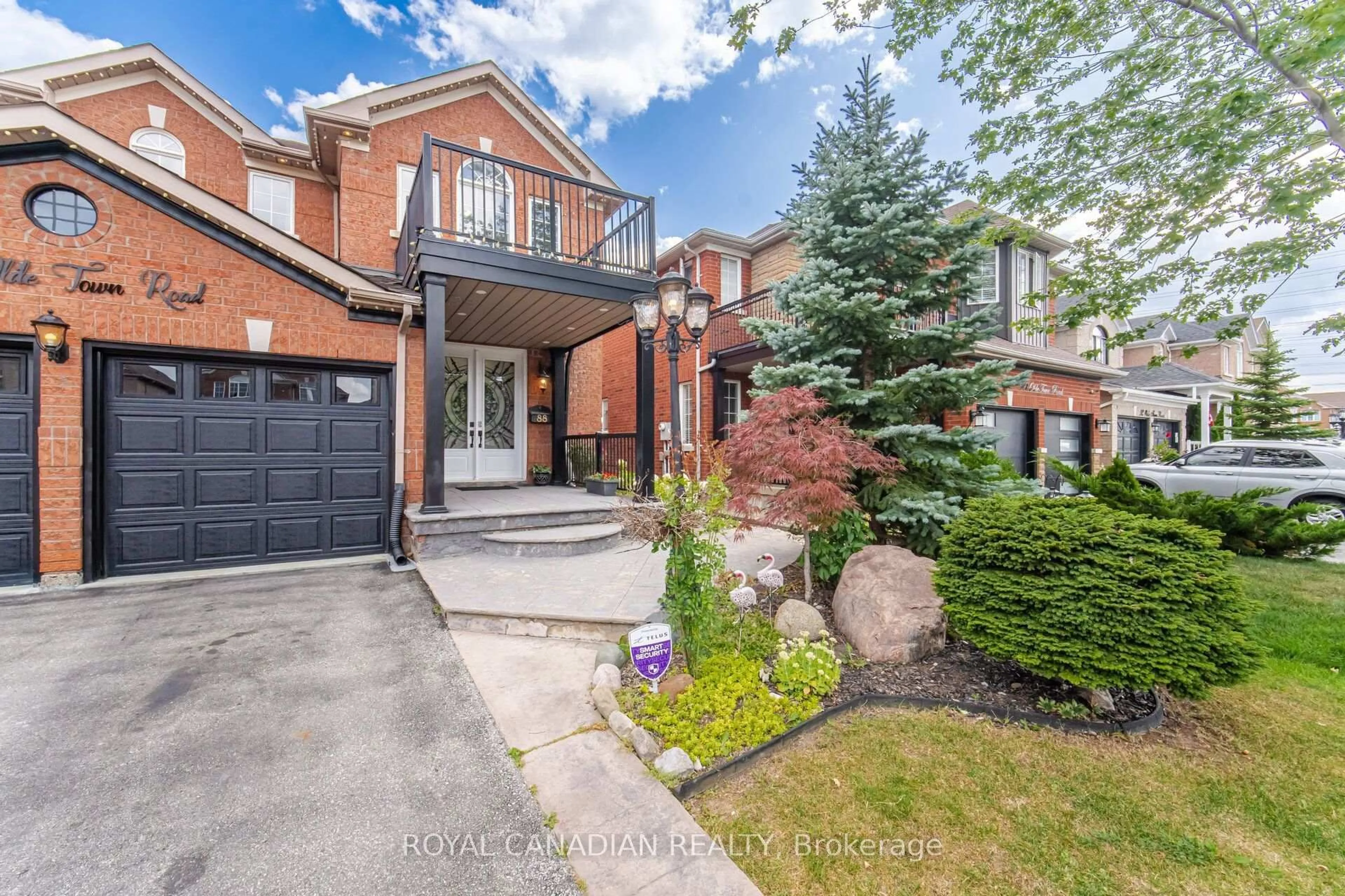 Home with brick exterior material, street for 88 Olde Town Rd, Brampton Ontario L6X 4X9