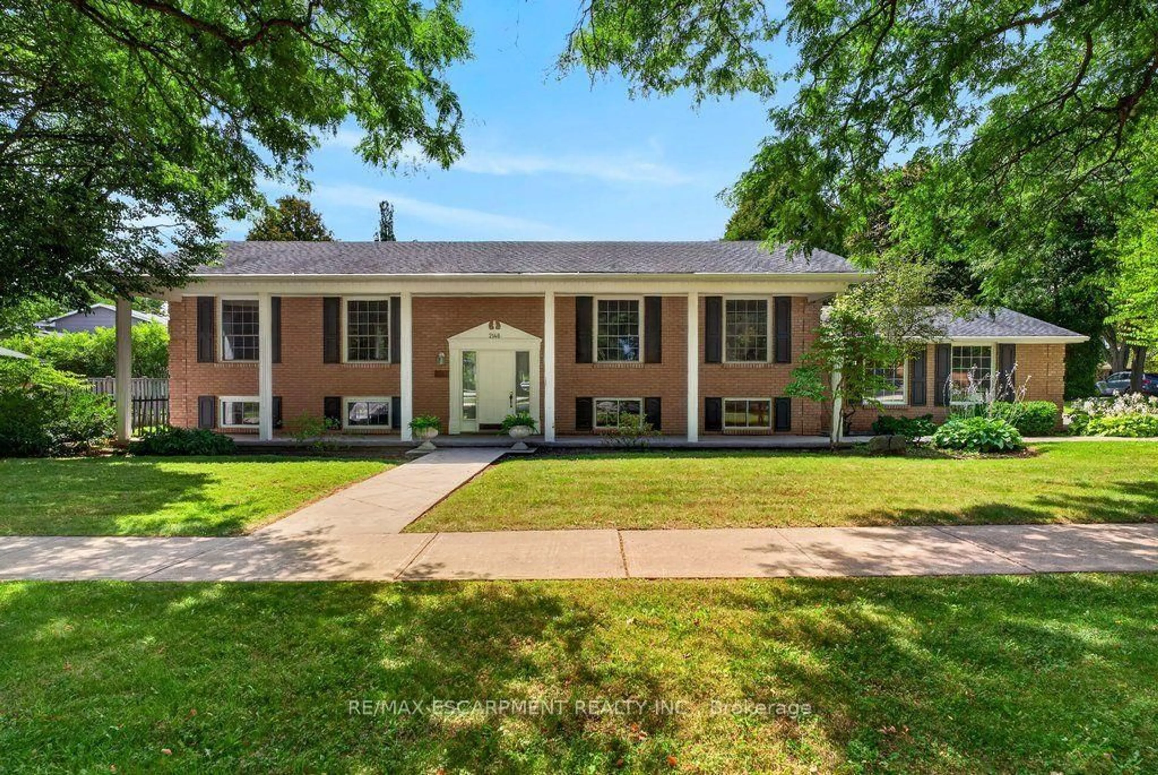 Home with brick exterior material, street for 2148 Kerns Rd, Burlington Ontario L7P 2W3