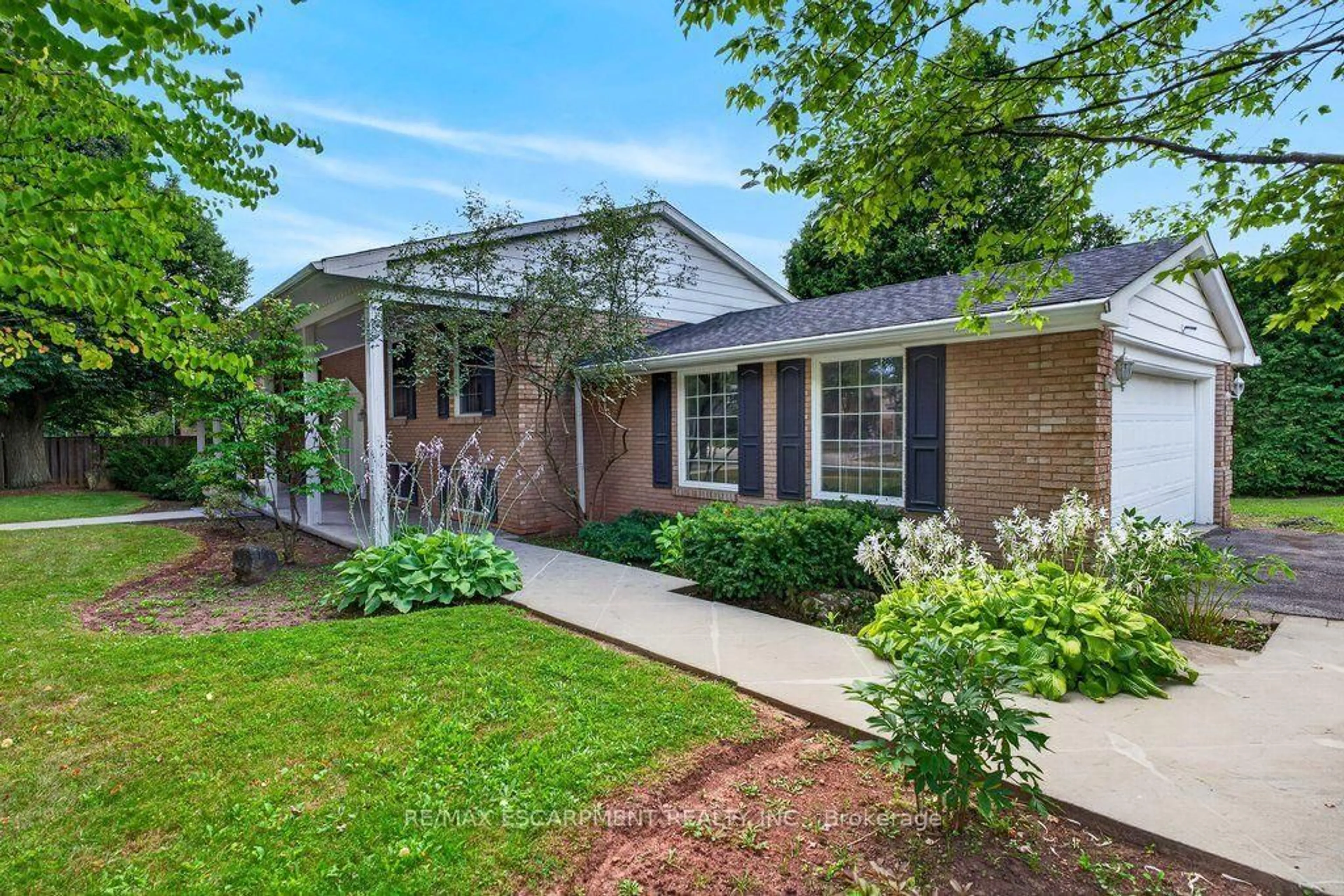 Home with brick exterior material, street for 2148 Kerns Rd, Burlington Ontario L7P 2W3