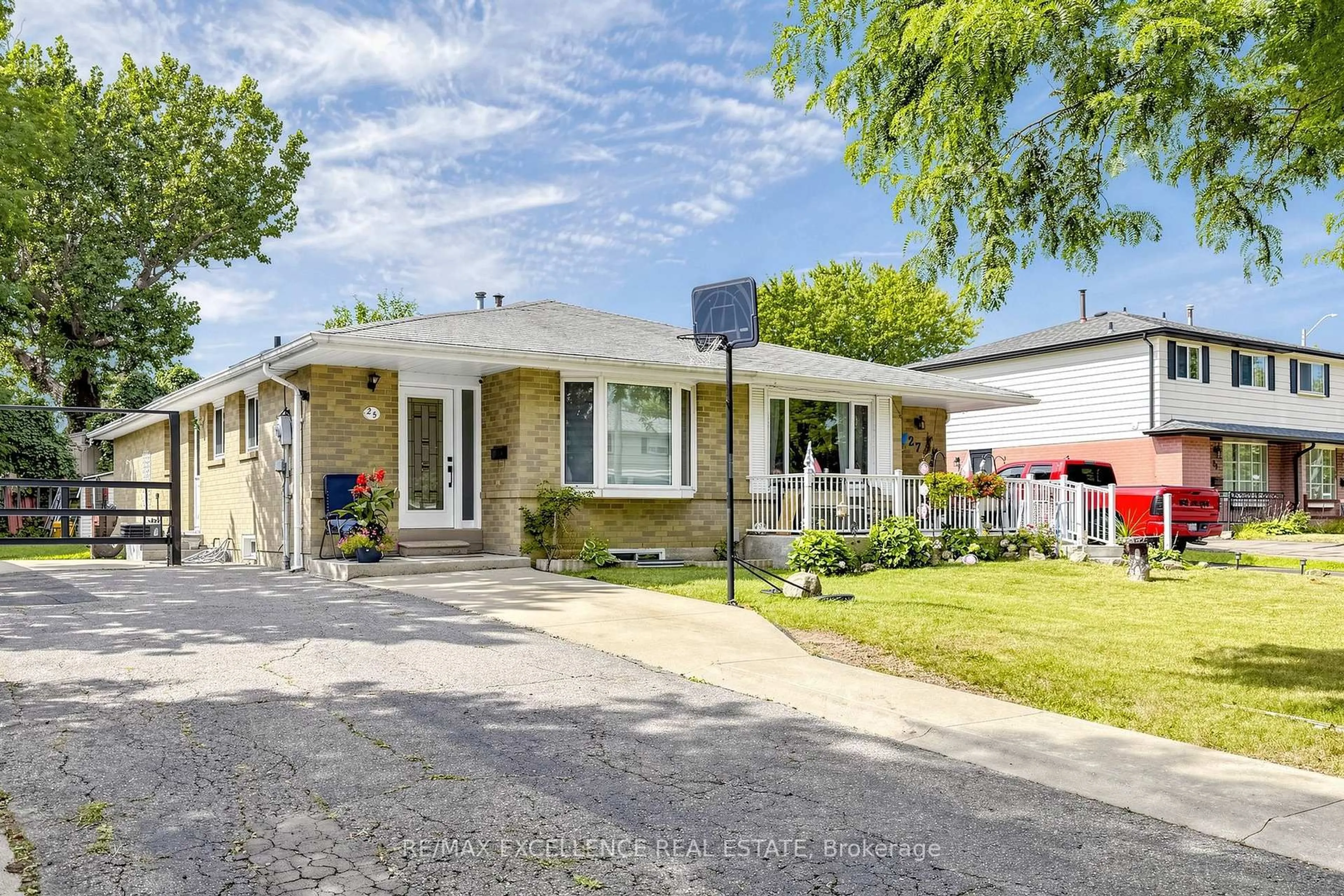Home with brick exterior material, street for 25 Graymar Rd, Brampton Ontario L6S 1Z7