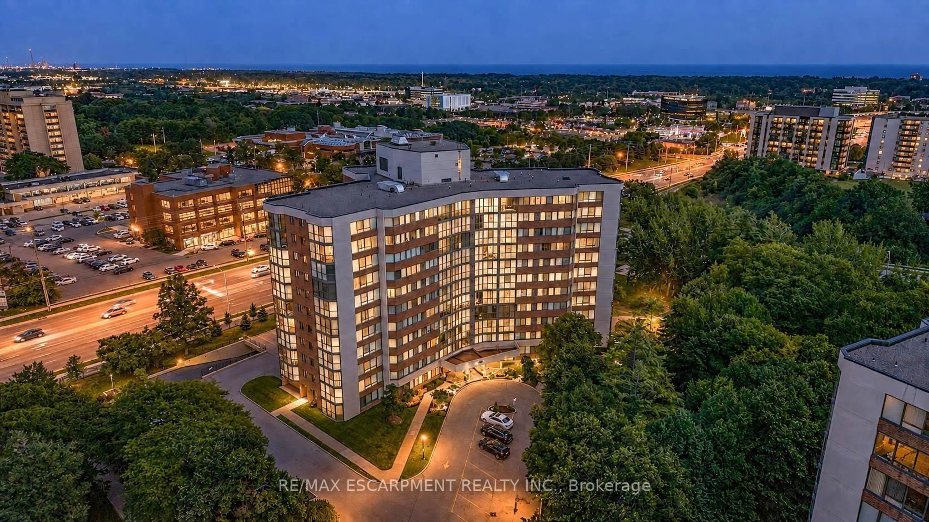 A pic from outside/outdoor area/front of a property/back of a property/a pic from drone, city buildings view from balcony for 1230 Marlborough Crt #202, Oakville Ontario L6H 3K6