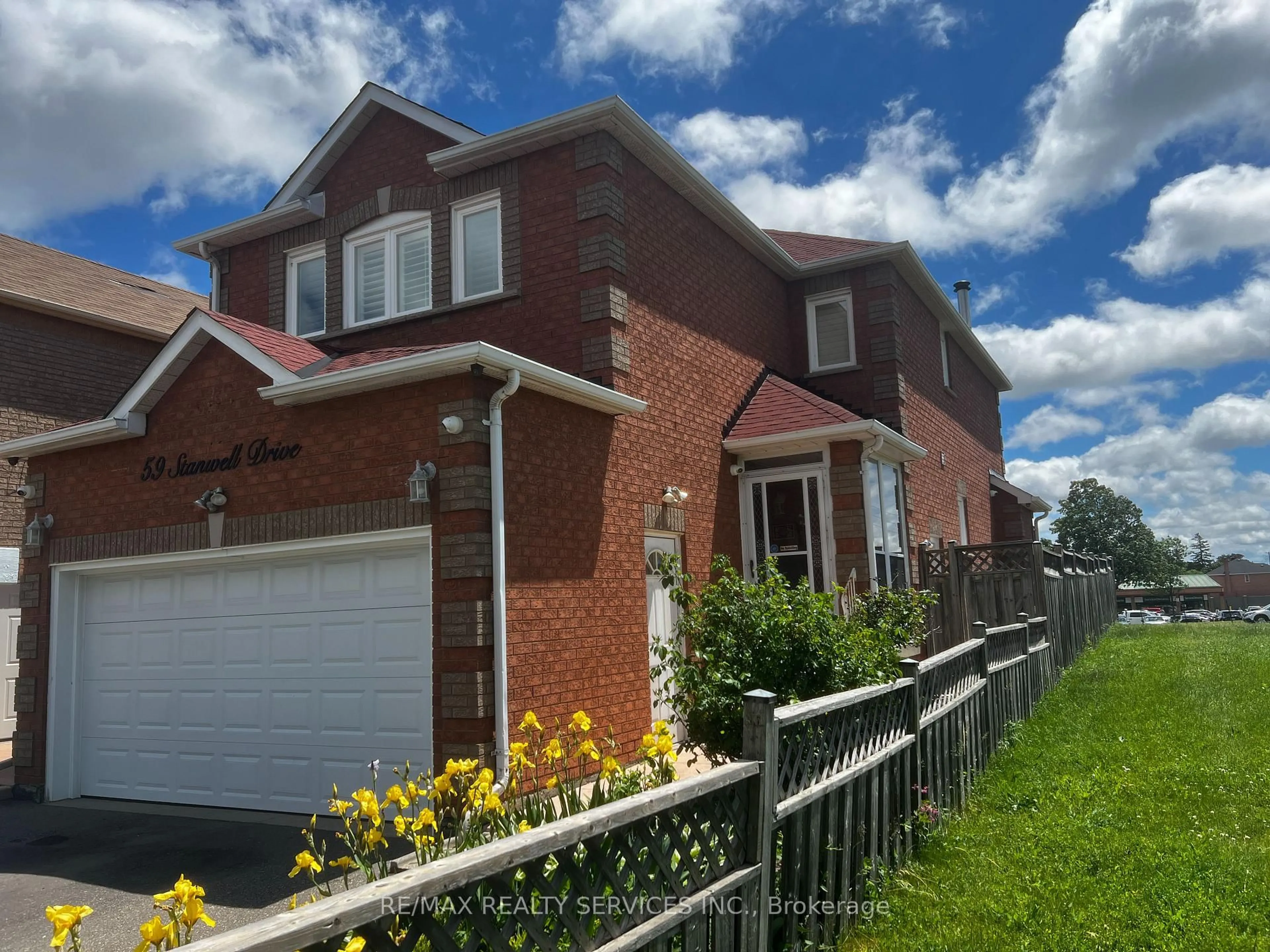 Home with brick exterior material, street for 59 Stanwell Dr, Brampton Ontario L6Z 3Y8