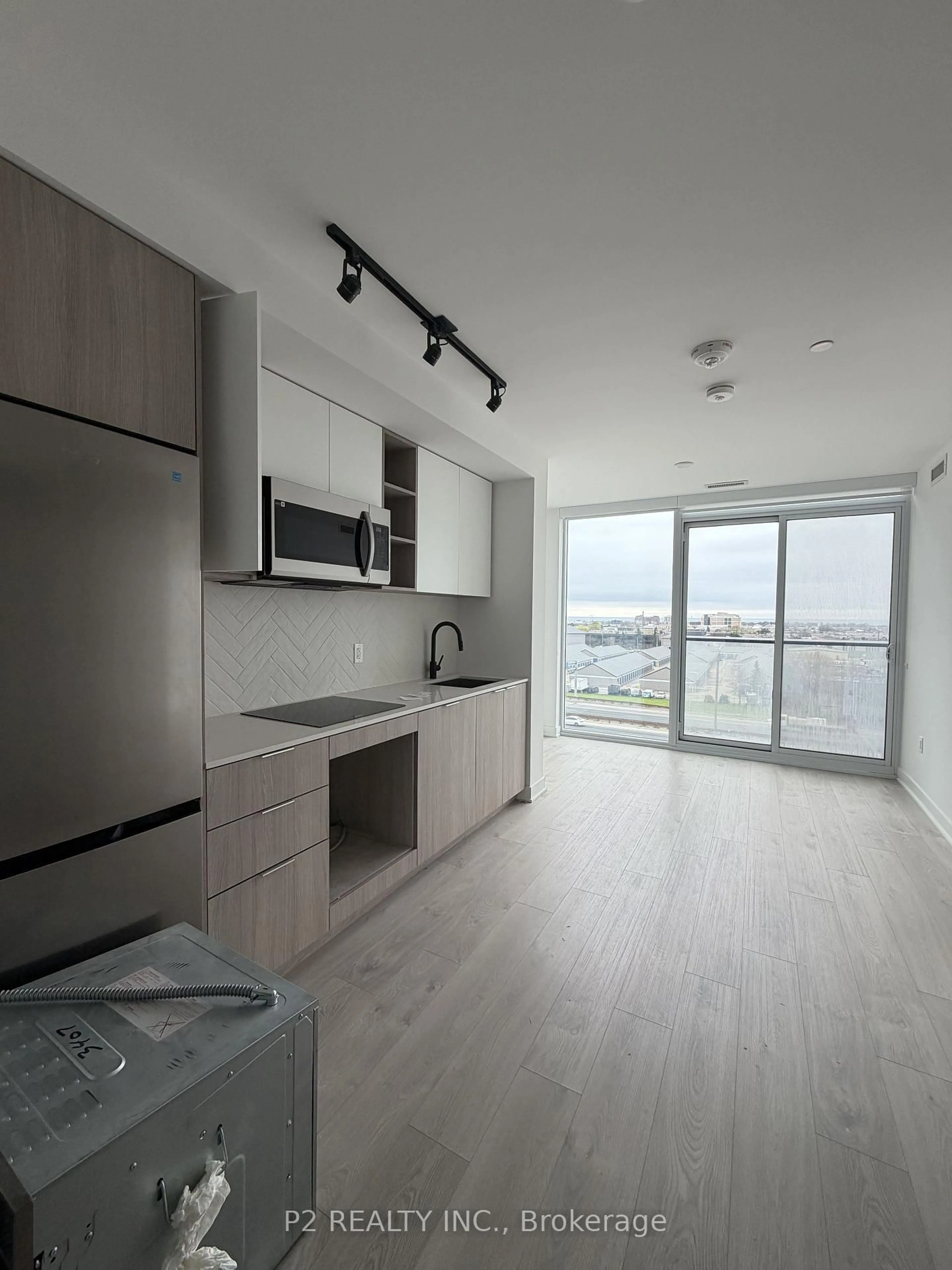 Open concept kitchen, wood/laminate floor for 36 Zorra St #628, Toronto Ontario M8Z 0G5