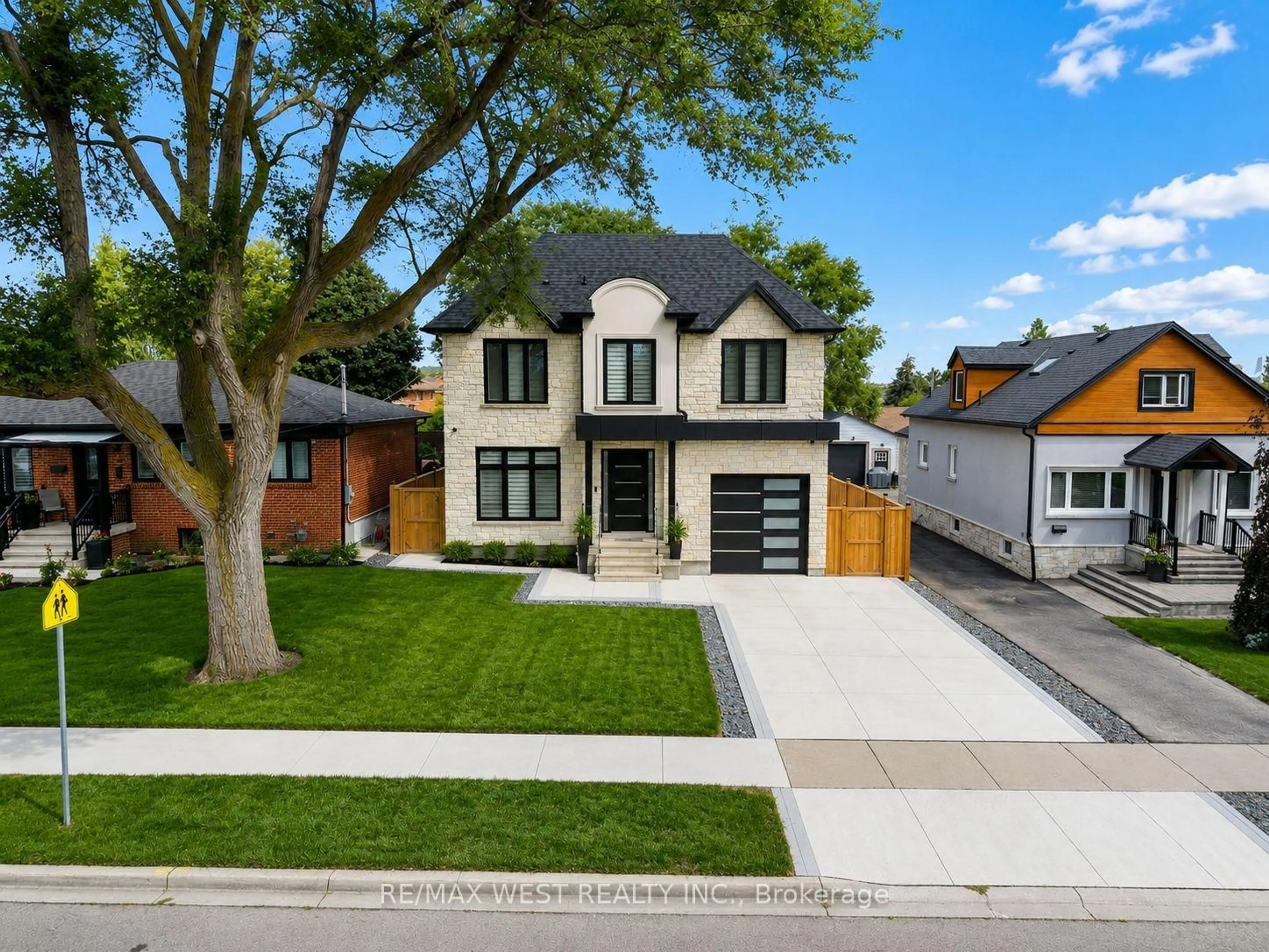 Home with brick exterior material, street for 46 Golfdown Dr, Toronto Ontario M9W 2H7