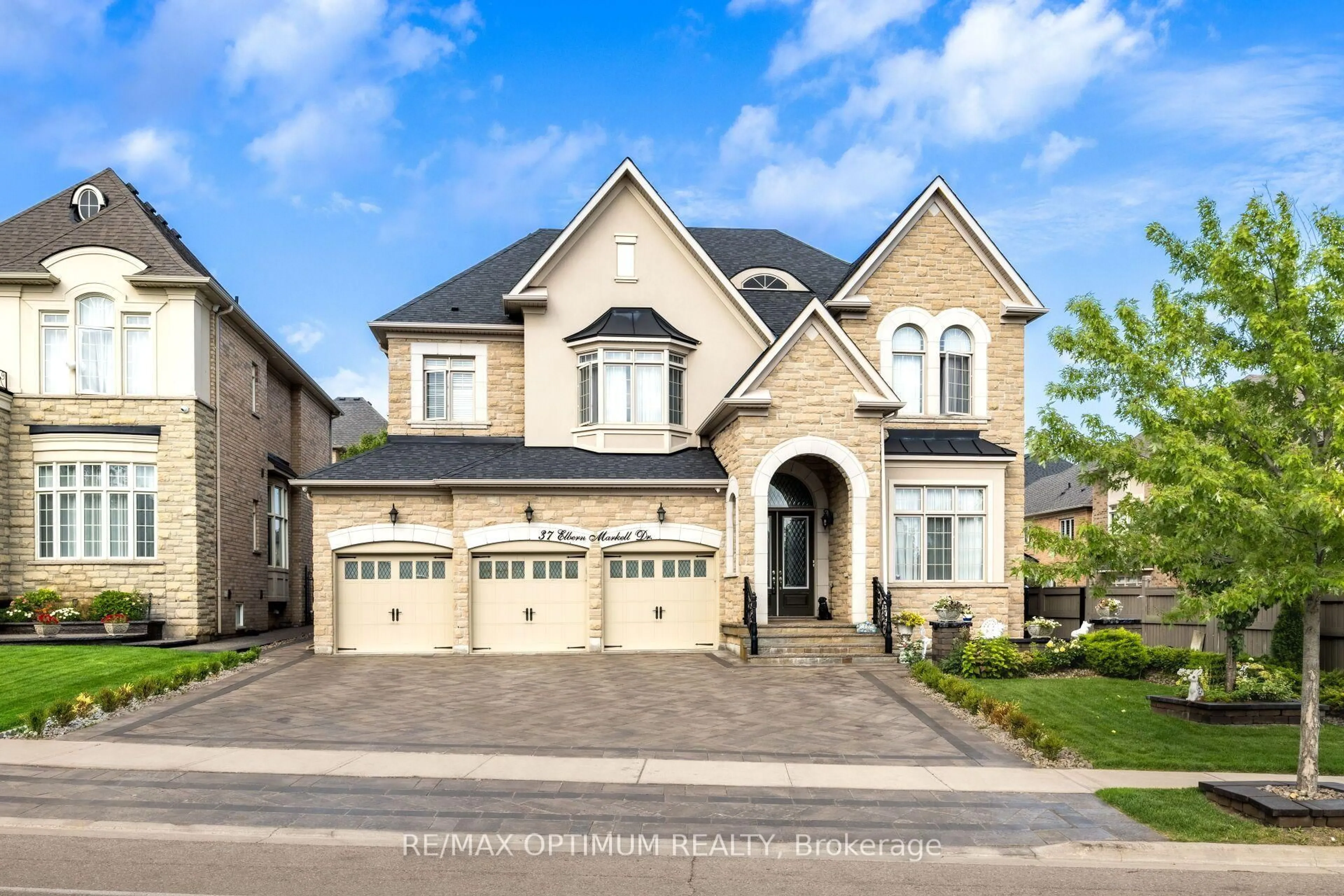 Home with brick exterior material, street for 37 Elbern Markell Dr, Brampton Ontario L6X 2X6
