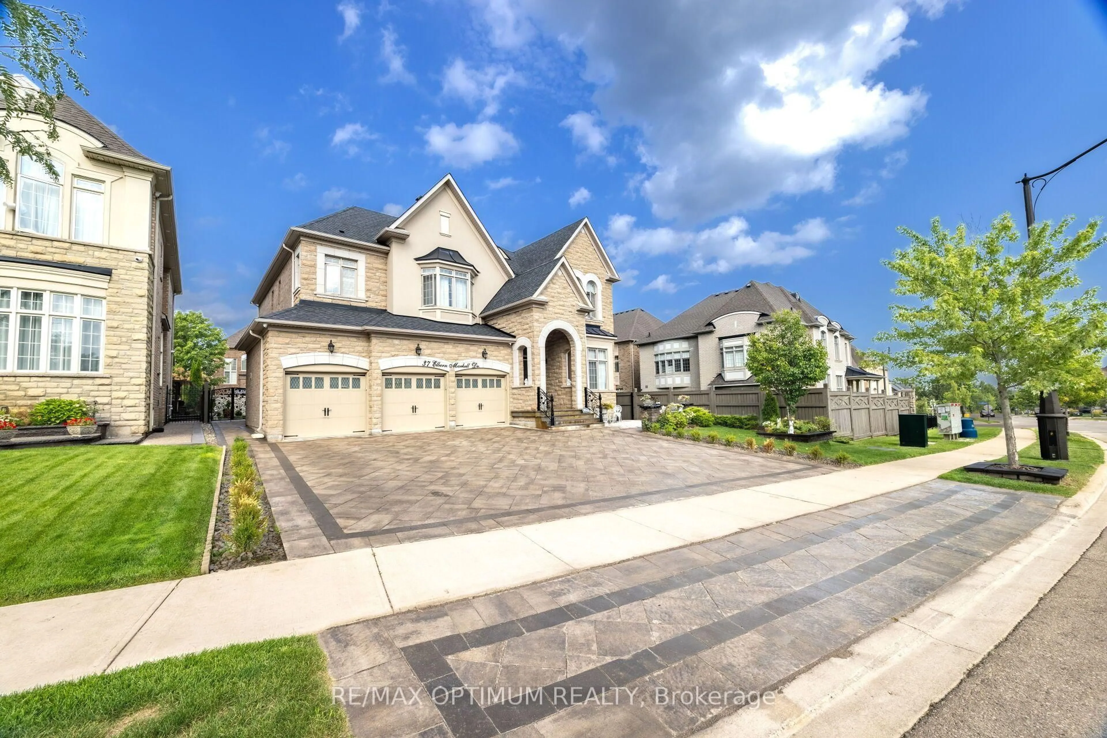 Home with brick exterior material, street for 37 Elbern Markell Dr, Brampton Ontario L6X 2X6