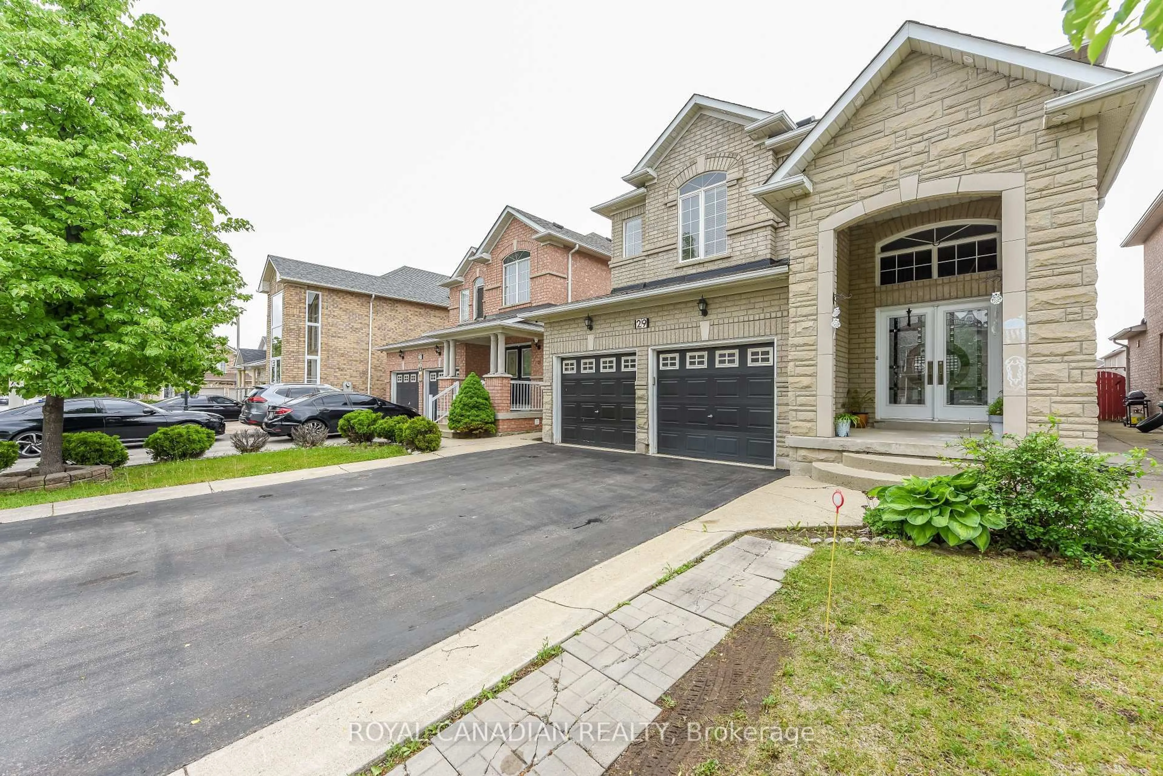 Home with brick exterior material, street for 29 Dewside Dr, Brampton Ontario L6R 3B7