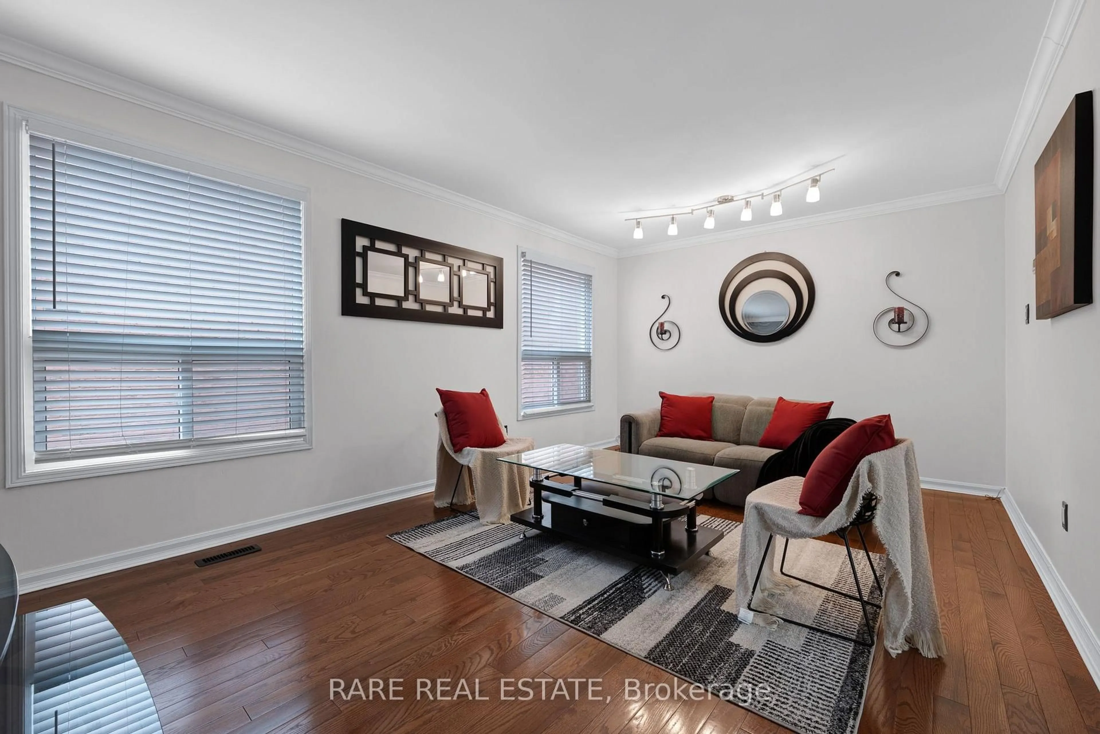 Living room with furniture, wood/laminate floor for 45 Sandmere Ave, Brampton Ontario L6Z 4A2