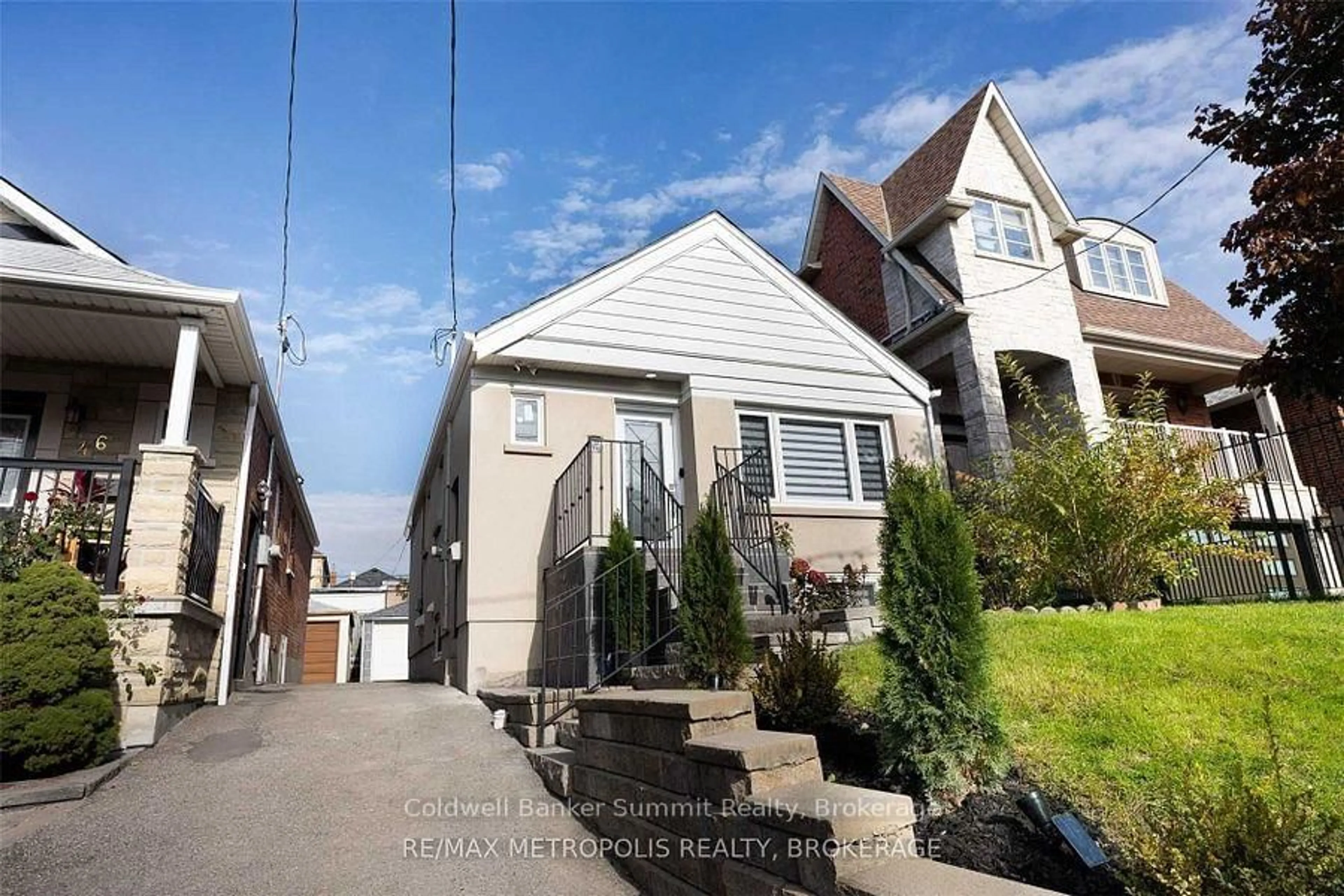 Home with vinyl exterior material, street for 44 Ypres Rd, Toronto Ontario M6M 1N9