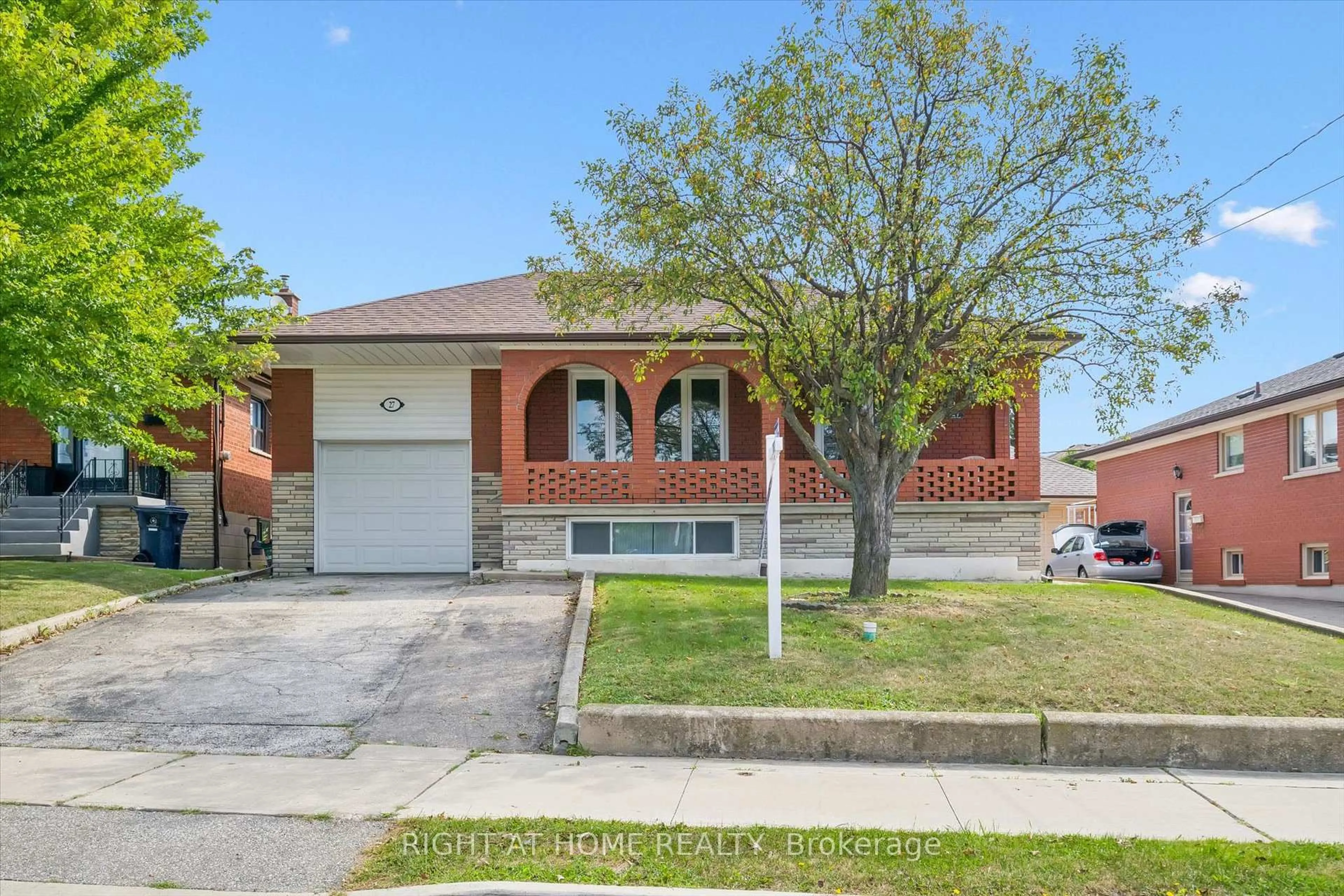 Home with brick exterior material, street for 27 Jocada Rd, Toronto Ontario M6L 2J4