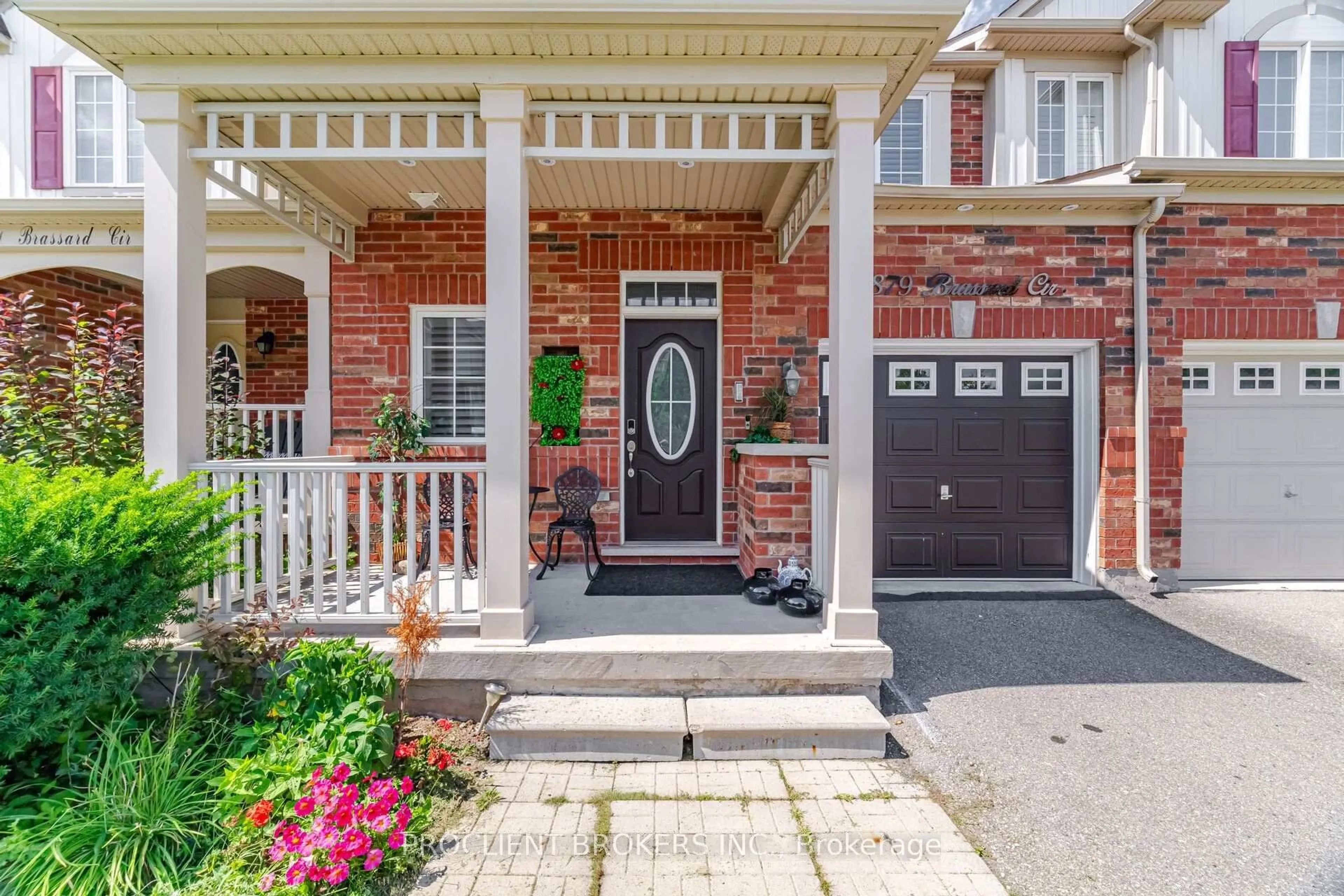Home with brick exterior material, street for 879 Brassard Circ, Milton Ontario L9T 8E2