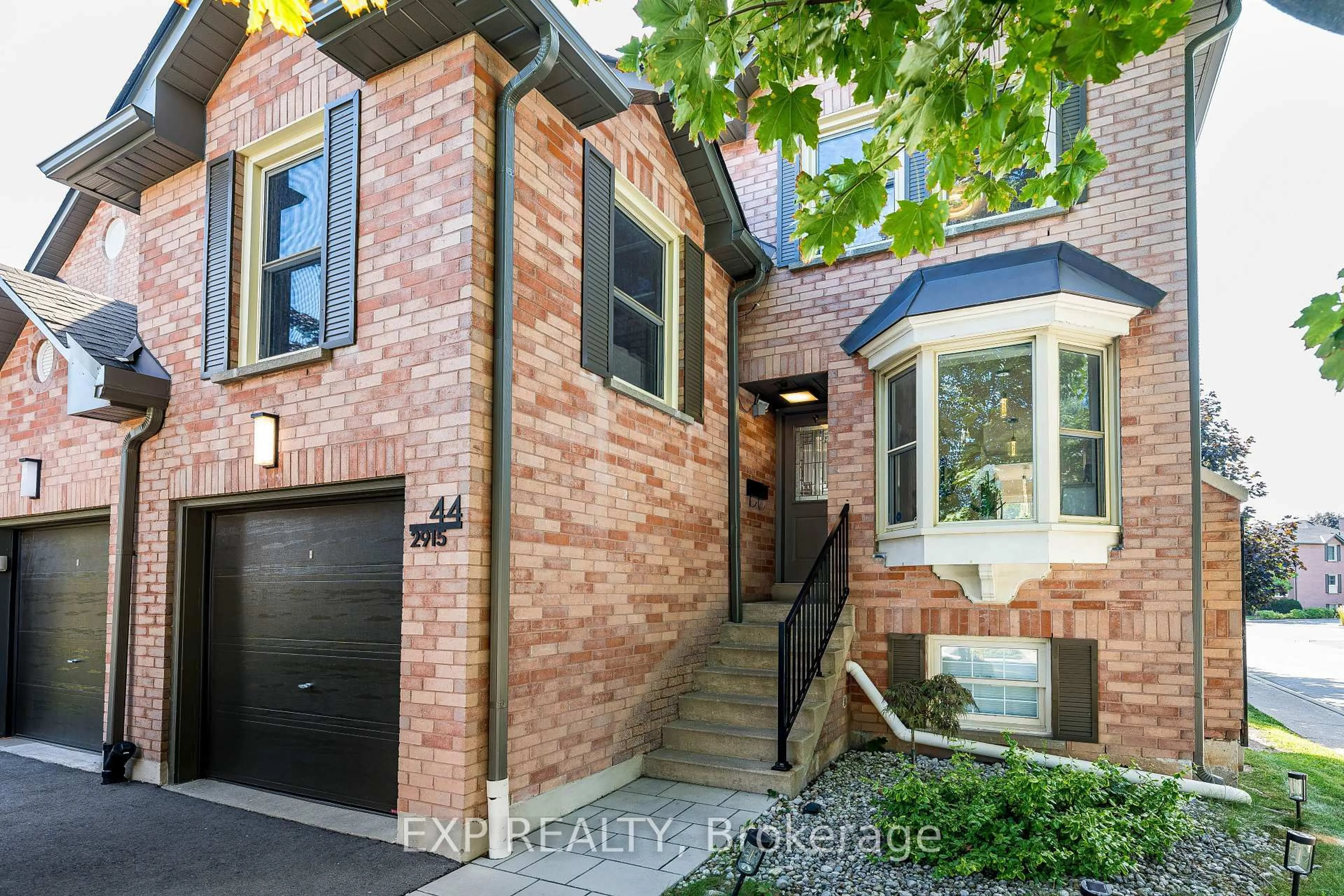 Home with brick exterior material, street for 2915 Headon Forest Dr #44, Burlington Ontario L7M 3Z6