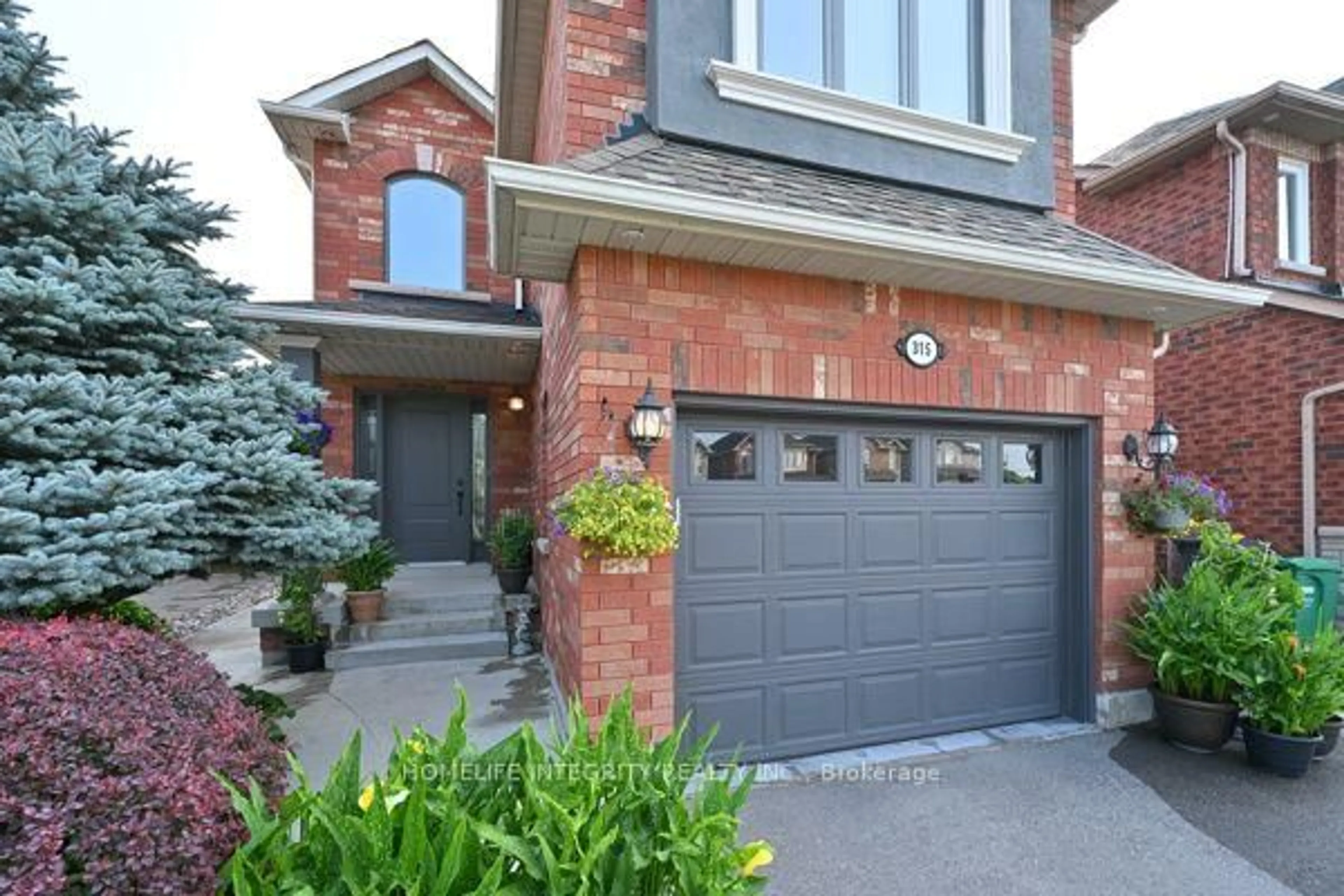 Home with brick exterior material, street for 315 Ellwood Dr, Caledon Ontario L7E 2G9