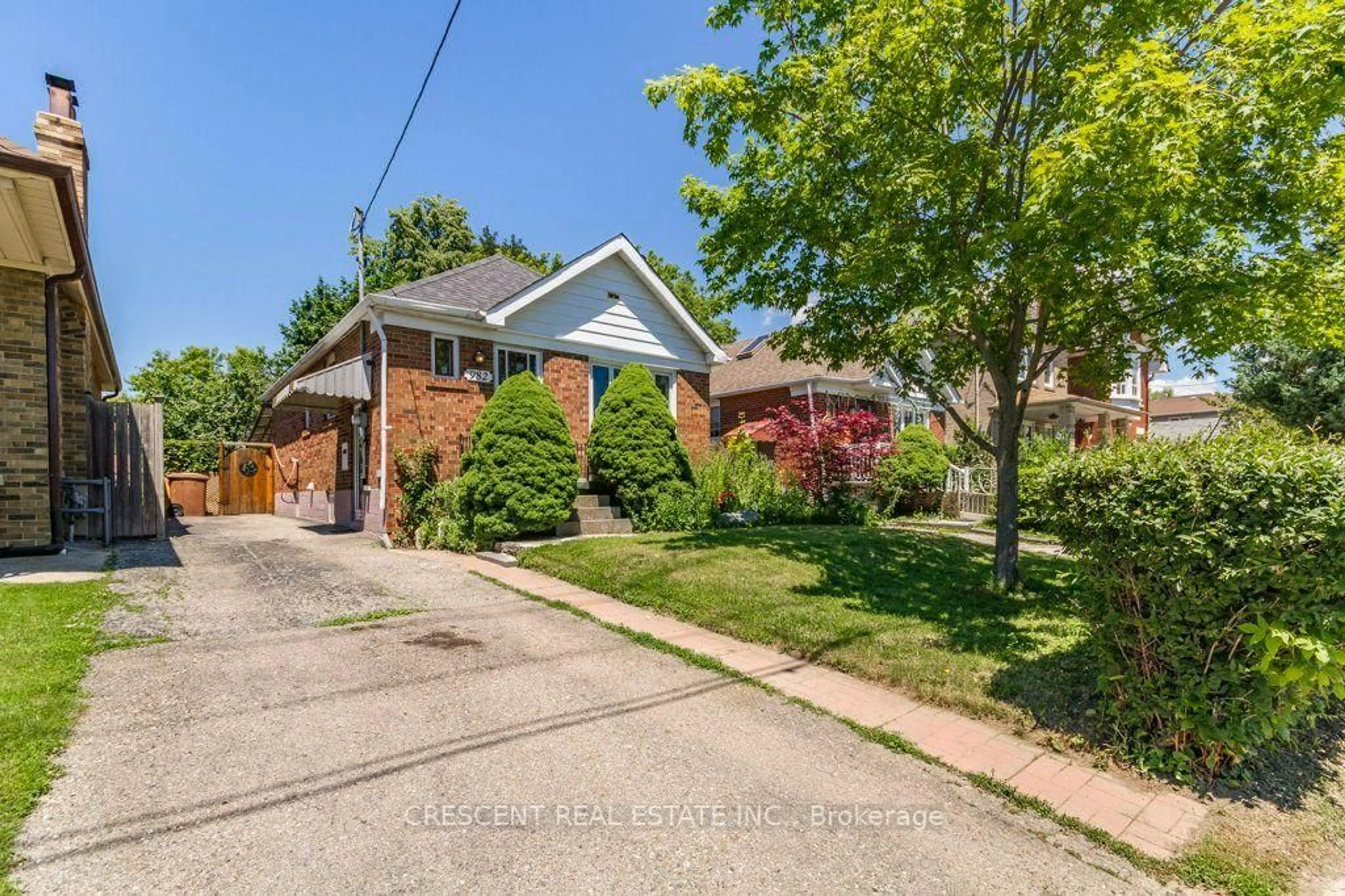 Home with brick exterior material, street for 982 Briar Hill Ave, Toronto Ontario M6B 1M3