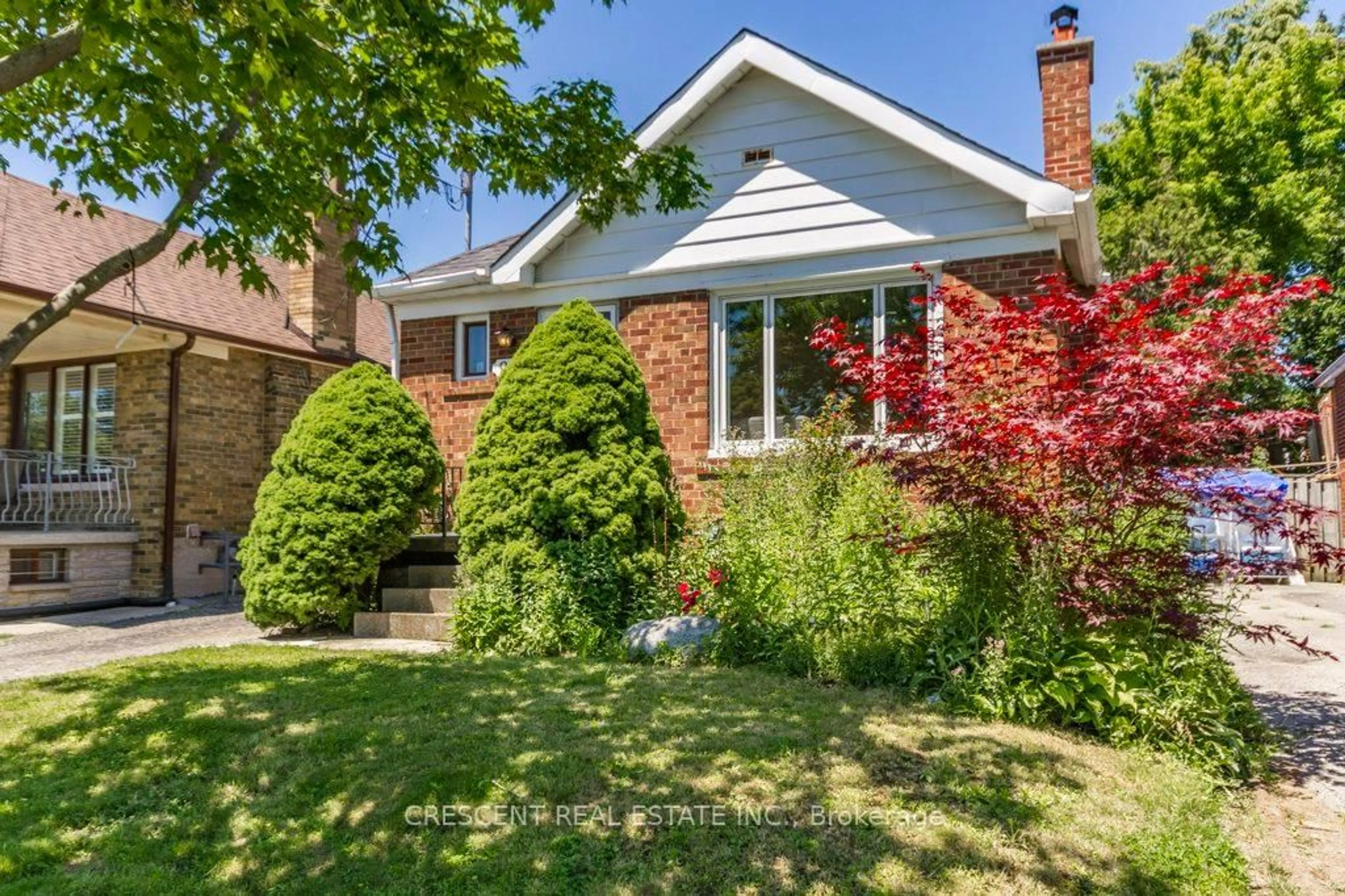 Home with brick exterior material, street for 982 Briar Hill Ave, Toronto Ontario M6B 1M3