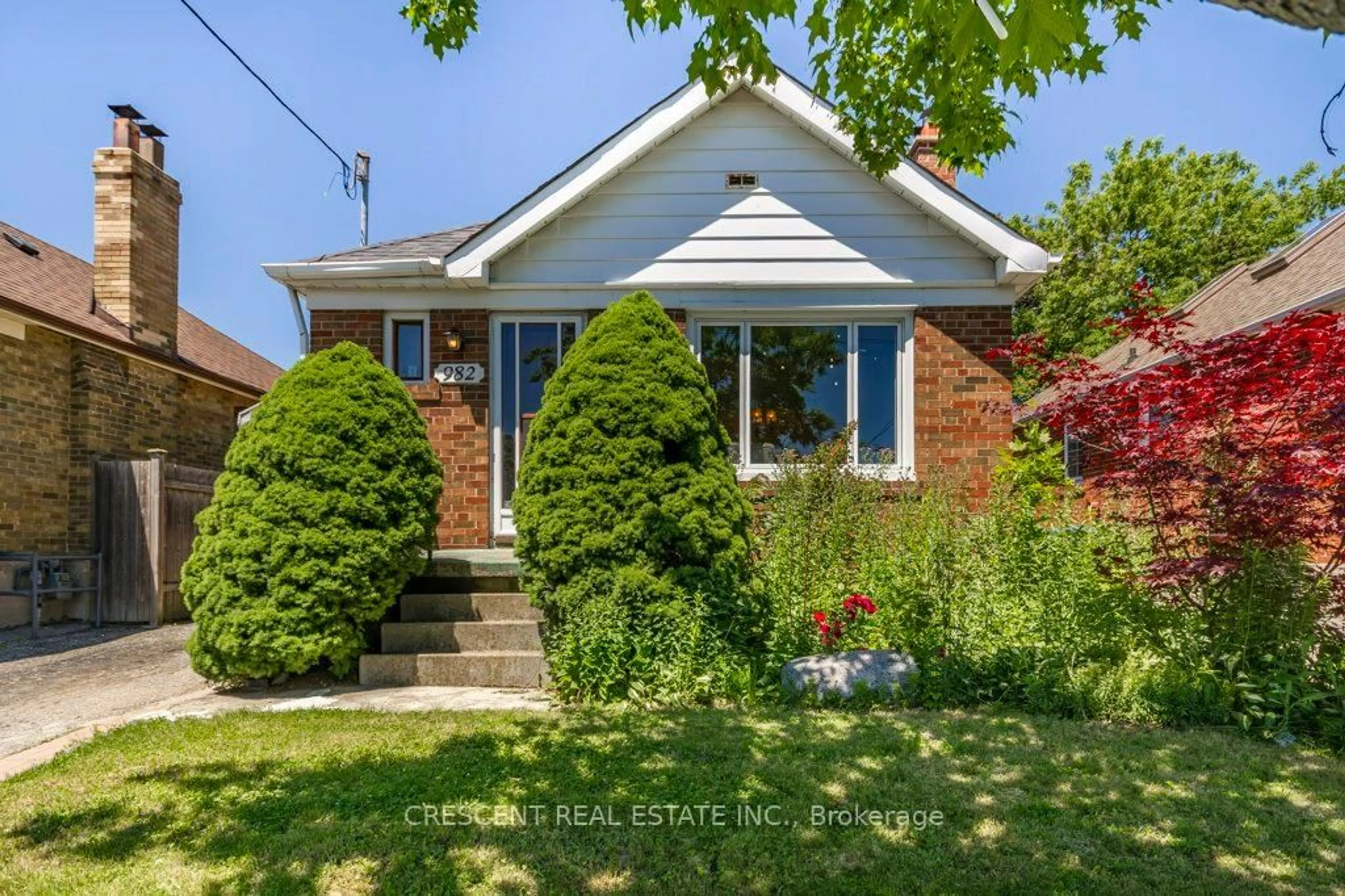 Home with brick exterior material, street for 982 Briar Hill Ave, Toronto Ontario M6B 1M3