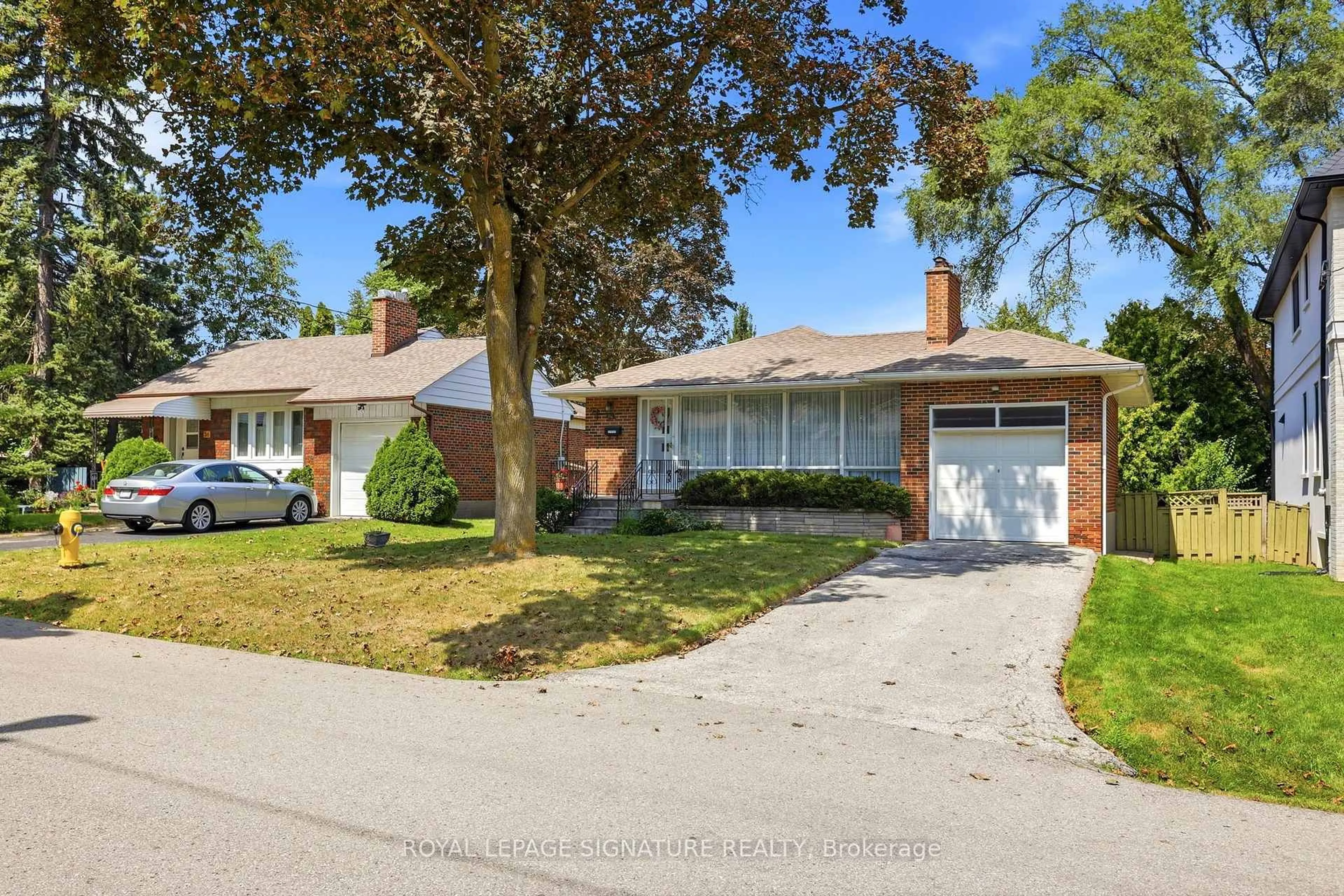 Home with brick exterior material, street for 40 Kirk Bradden Rd, Toronto Ontario M8Y 2E7