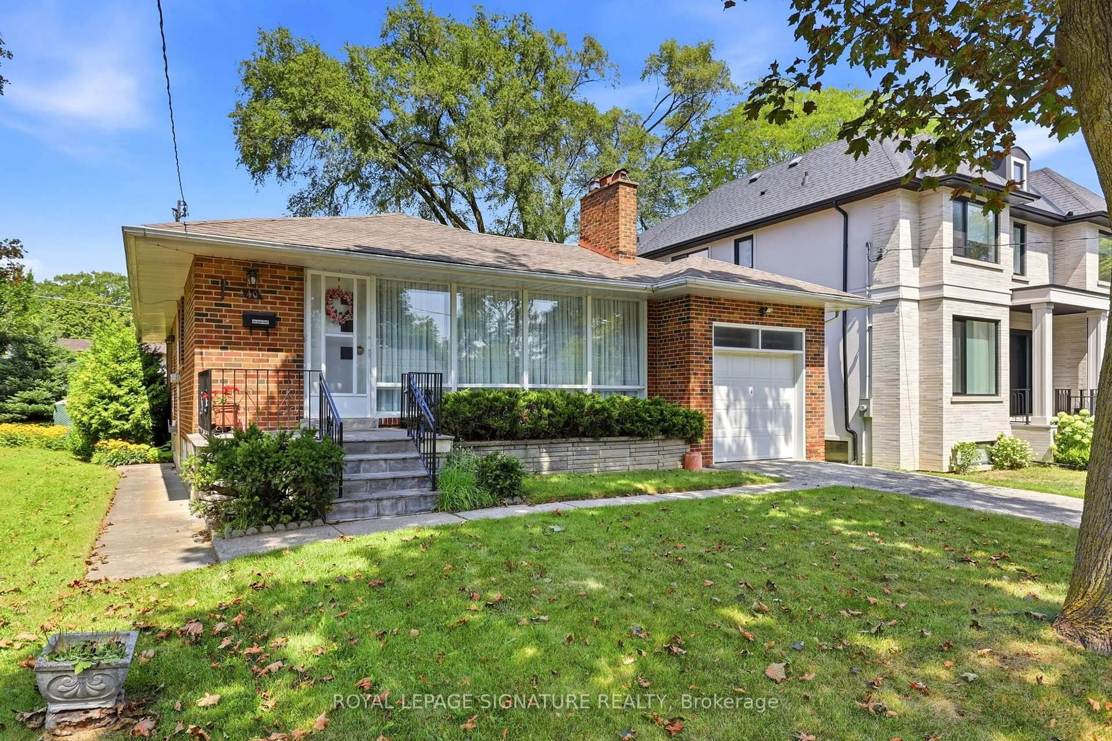 Home with brick exterior material, street for 40 Kirk Bradden Rd, Toronto Ontario M8Y 2E7