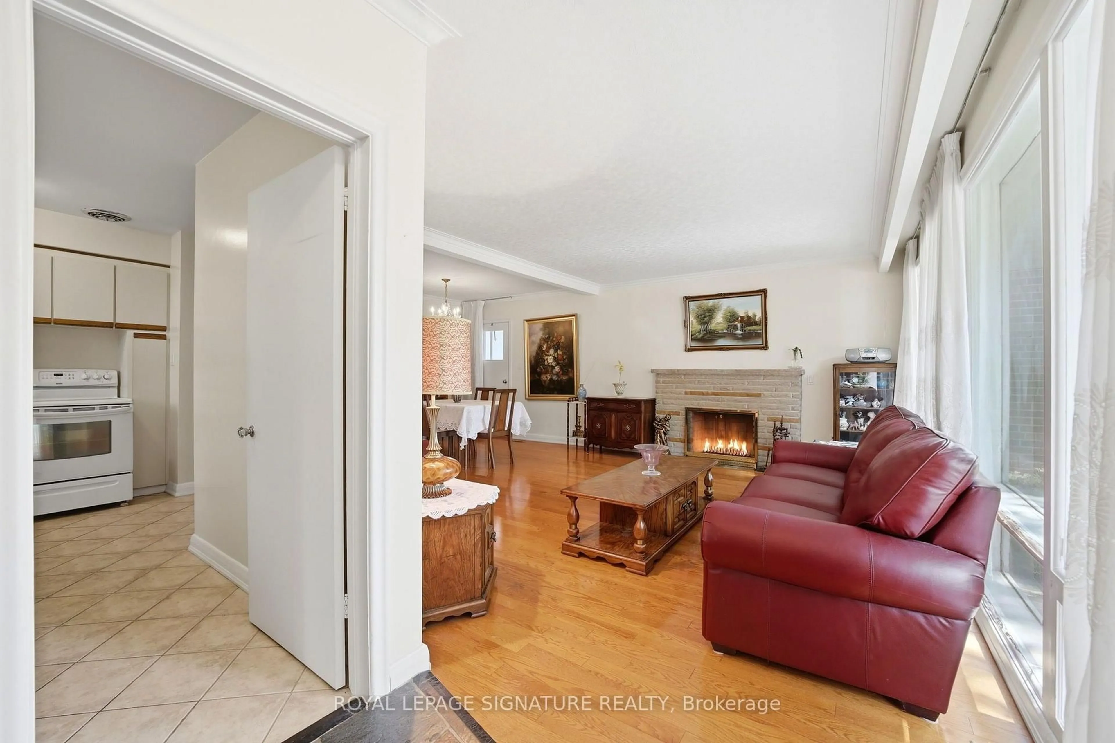 Living room with furniture, unknown for 40 Kirk Bradden Rd, Toronto Ontario M8Y 2E7