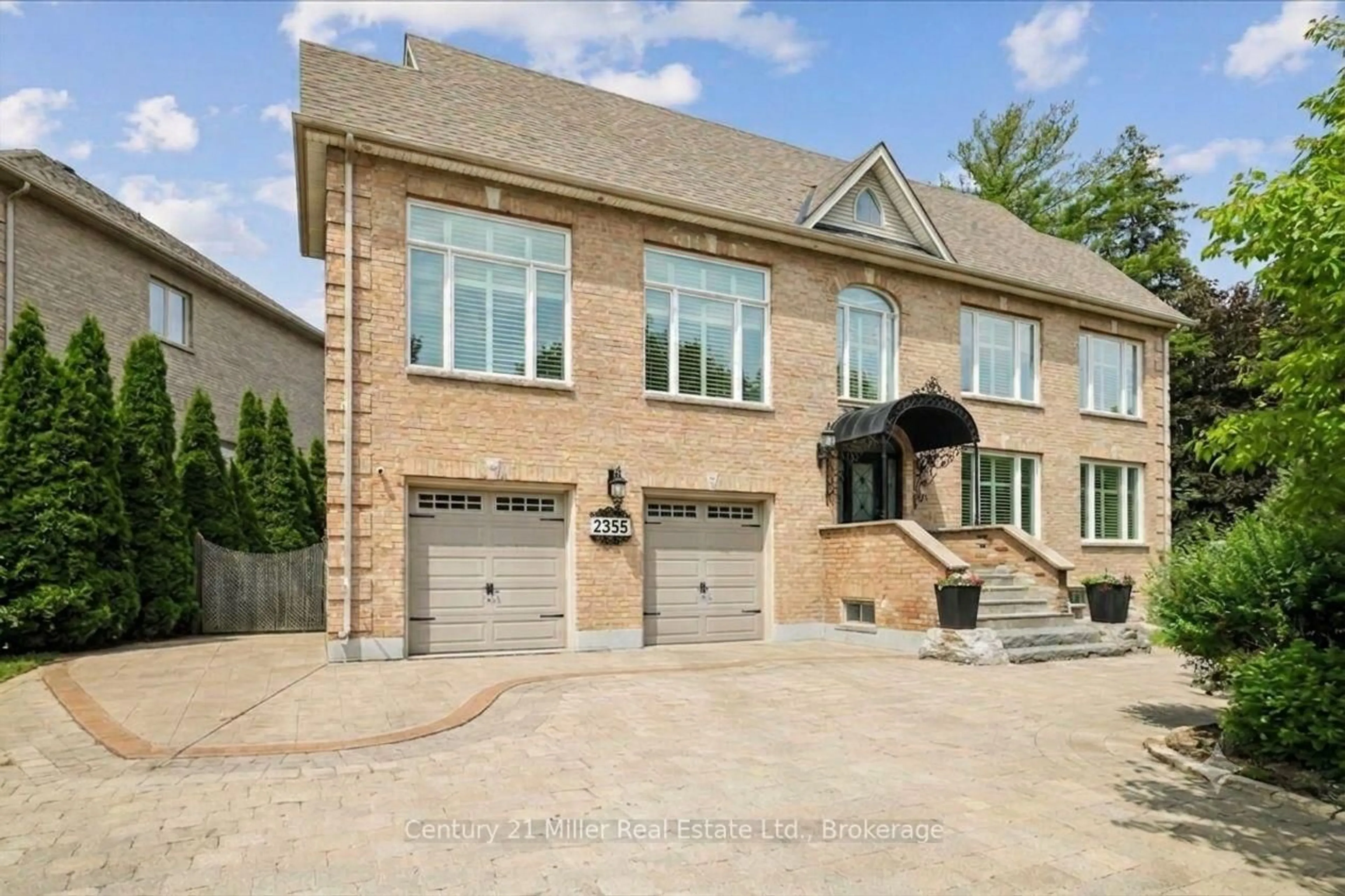 Home with brick exterior material, street for 2355 Old Carriage Rd, Mississauga Ontario L5C 1Y6