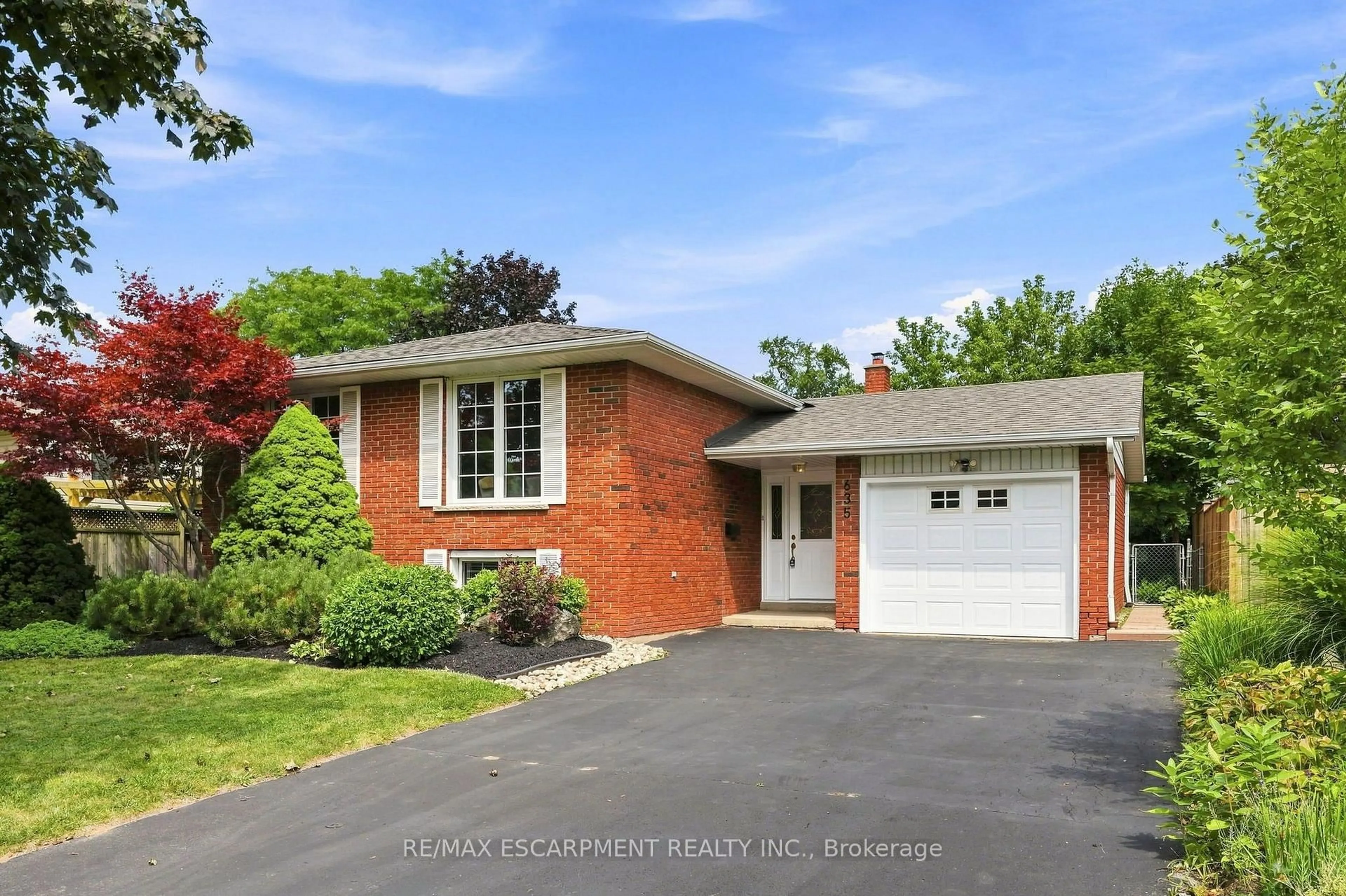 Home with brick exterior material, street for 635 Ramsgate Rd, Burlington Ontario L7N 2X9