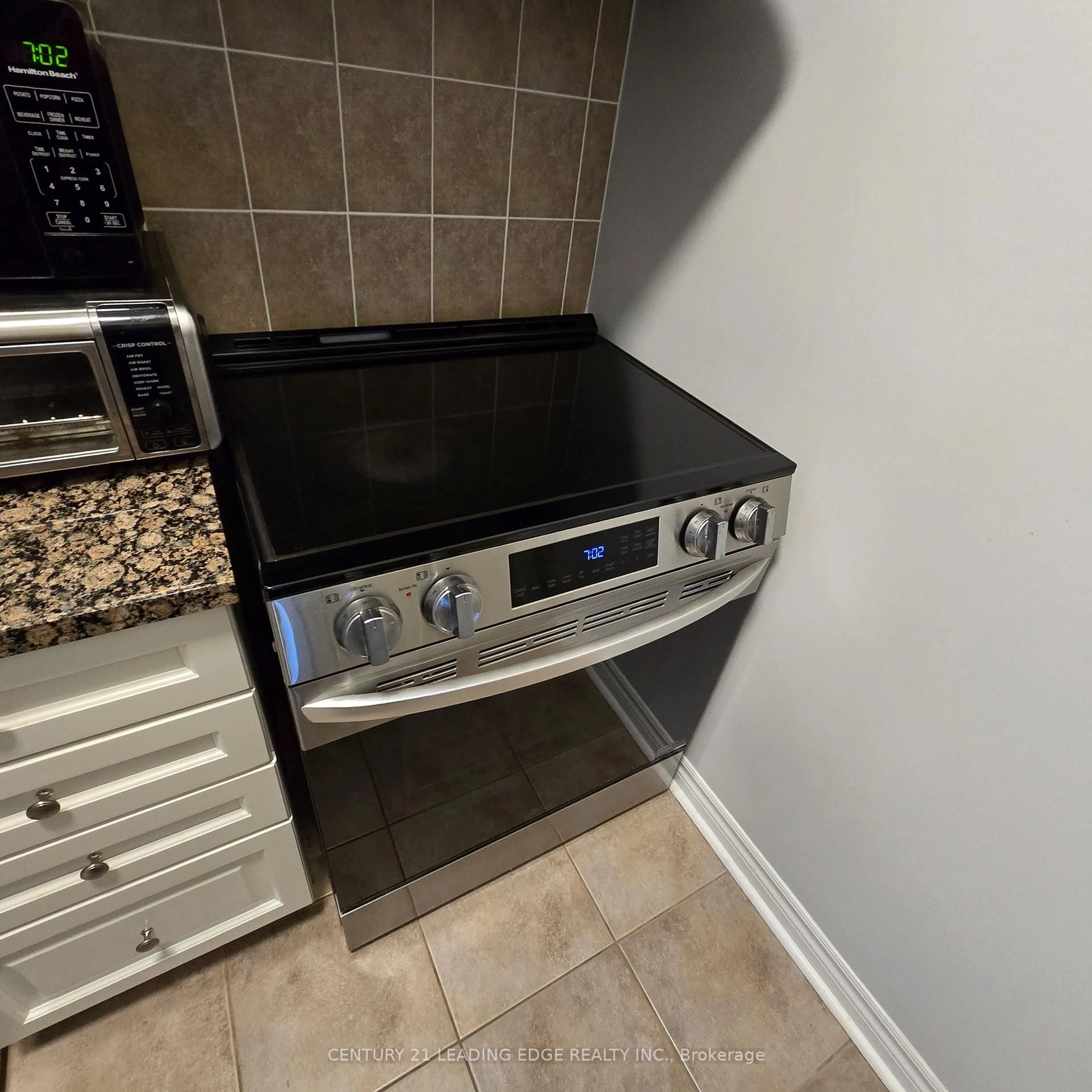 Standard kitchen, ceramic/tile floor for 2325 Central Park Dr #103, Oakville Ontario L6H 0E2