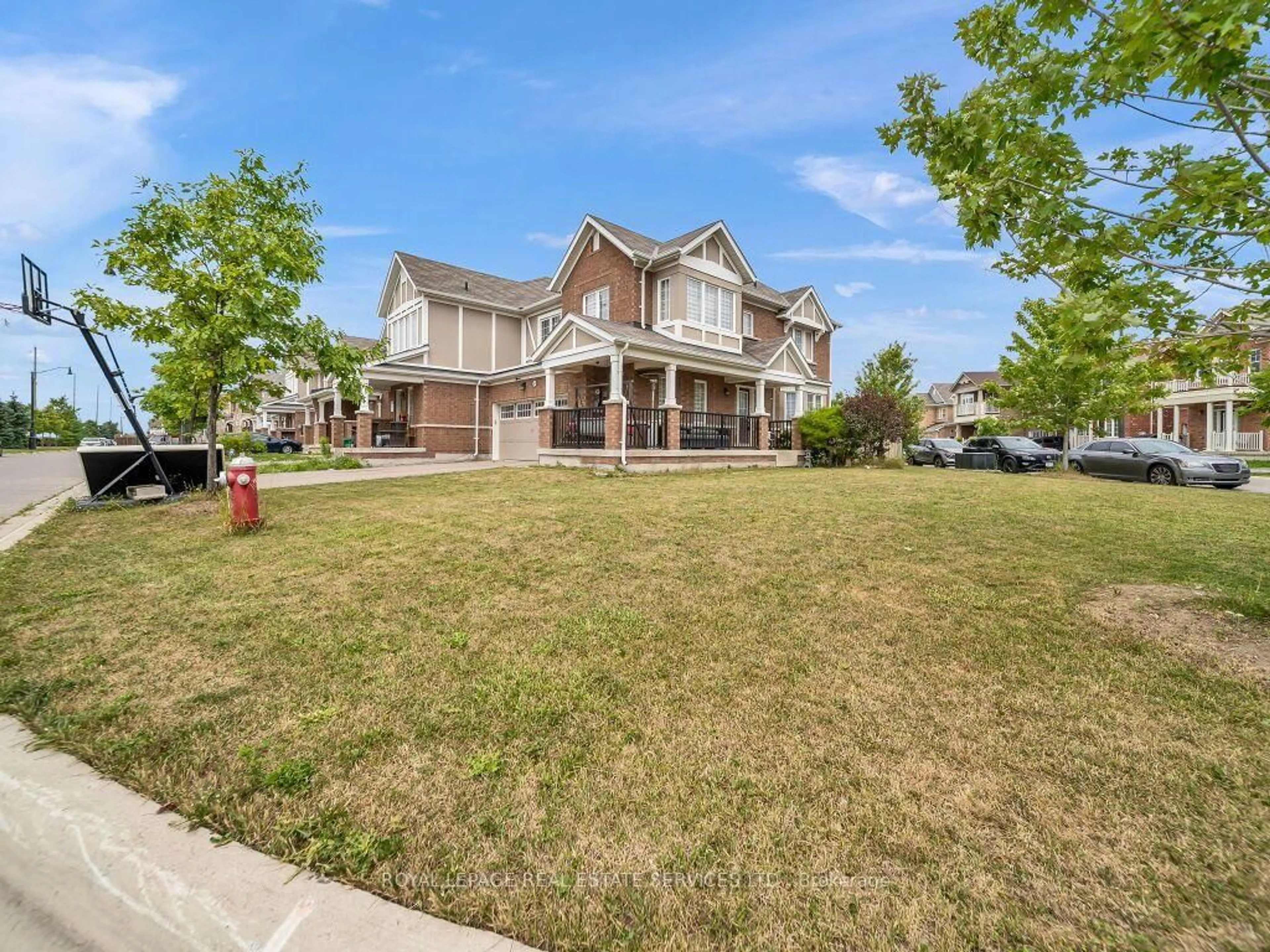 A pic from outside/outdoor area/front of a property/back of a property/a pic from drone, street for 61 Rockbrook Tr, Brampton Ontario L7A 4H9