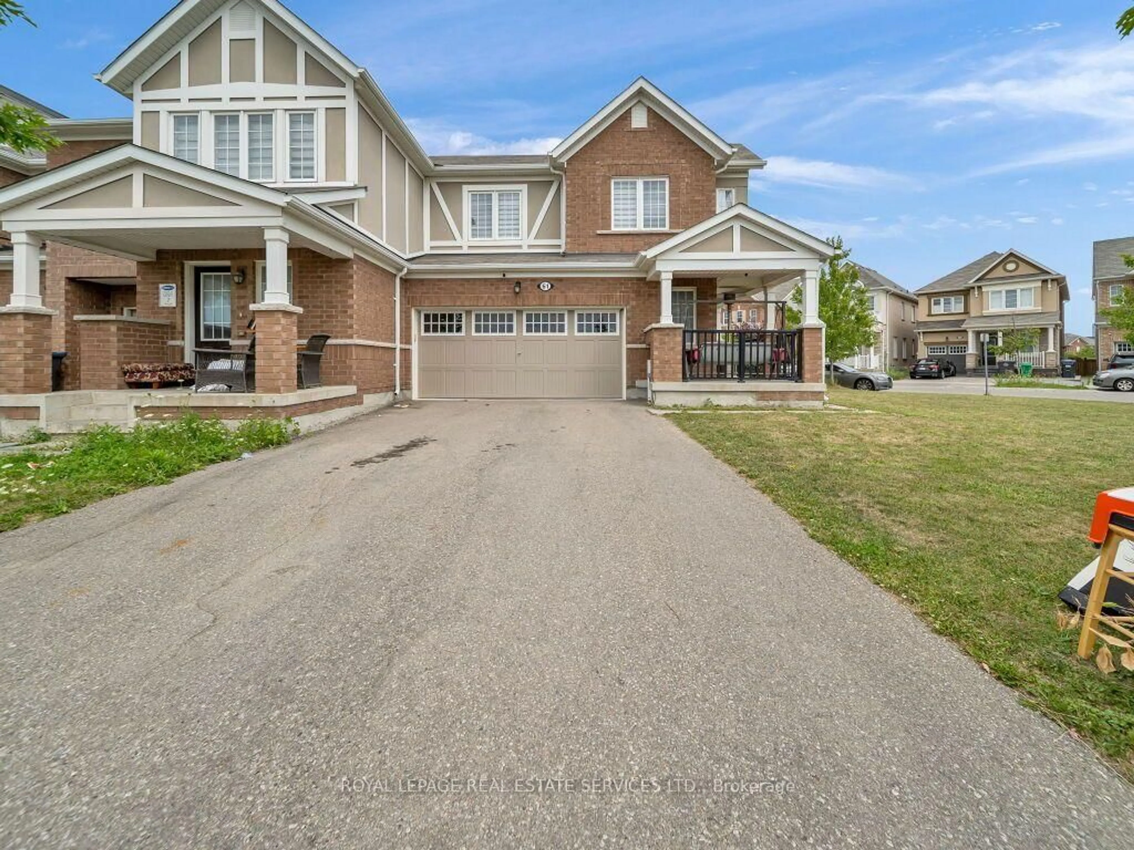 Home with brick exterior material, street for 61 Rockbrook Tr, Brampton Ontario L7A 4H9