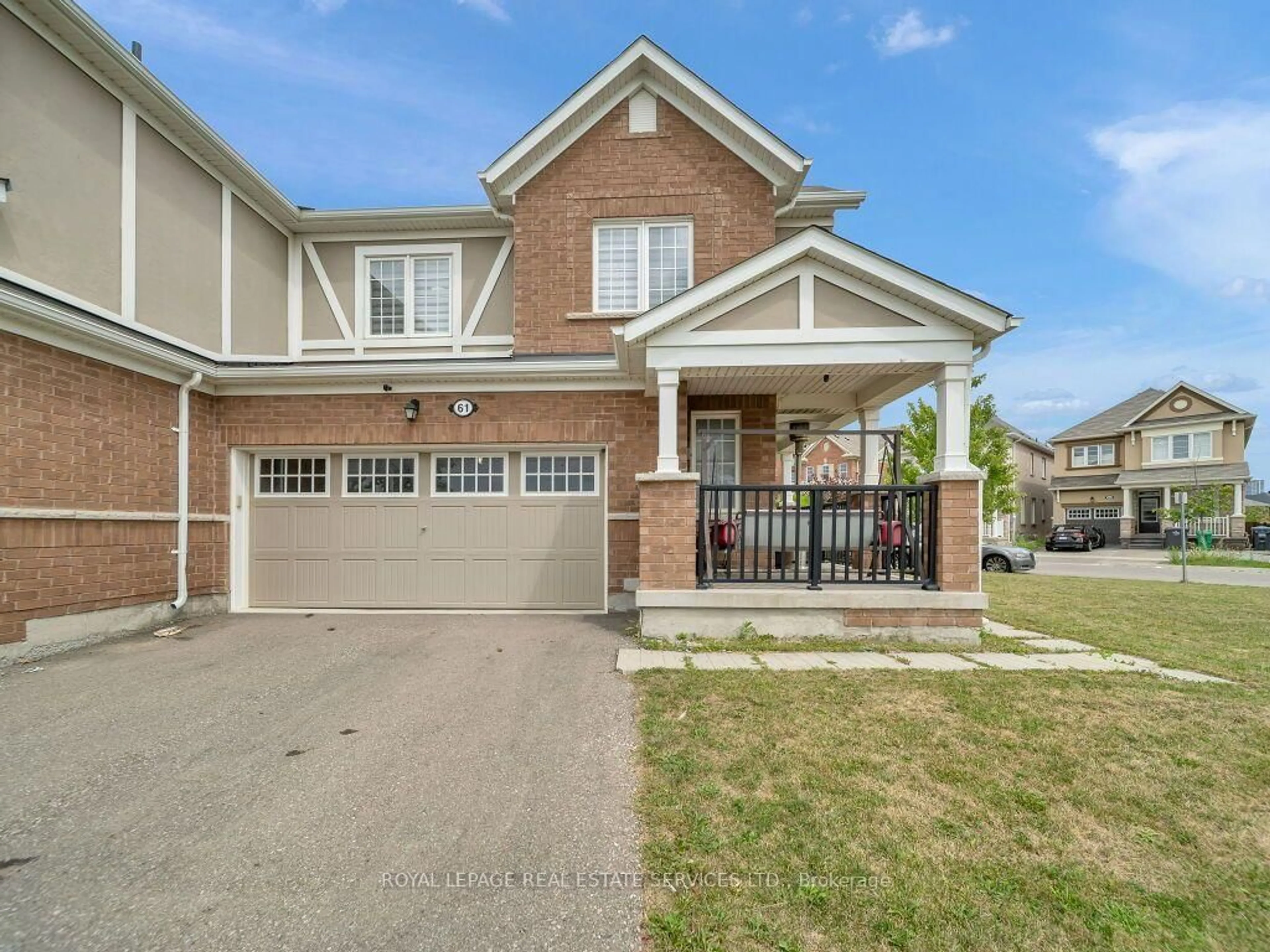 Home with brick exterior material, street for 61 Rockbrook Tr, Brampton Ontario L7A 4H9