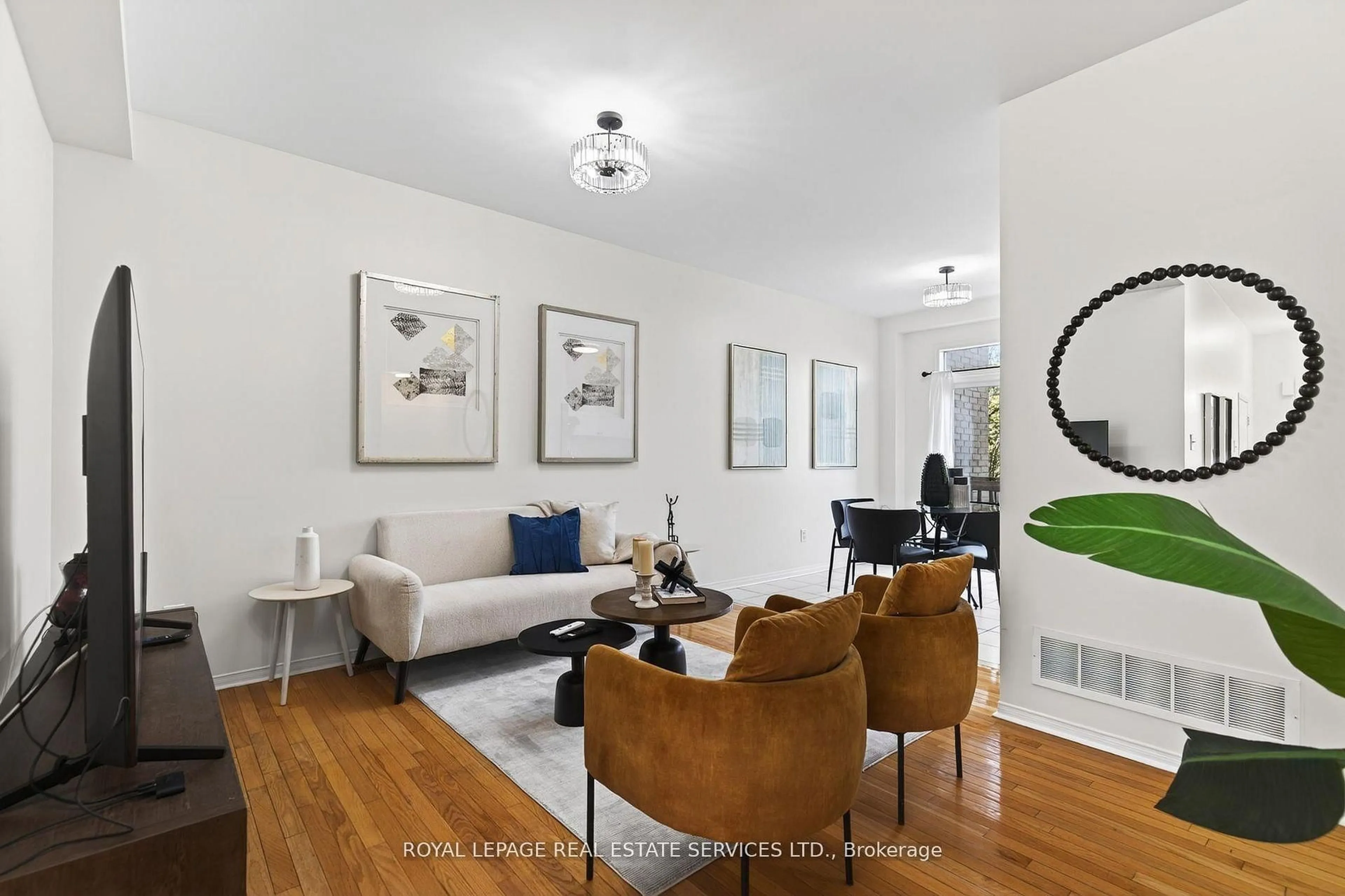 Living room with furniture, wood/laminate floor for 2307 Stone Glen Cres, Oakville Ontario L6M 0C9