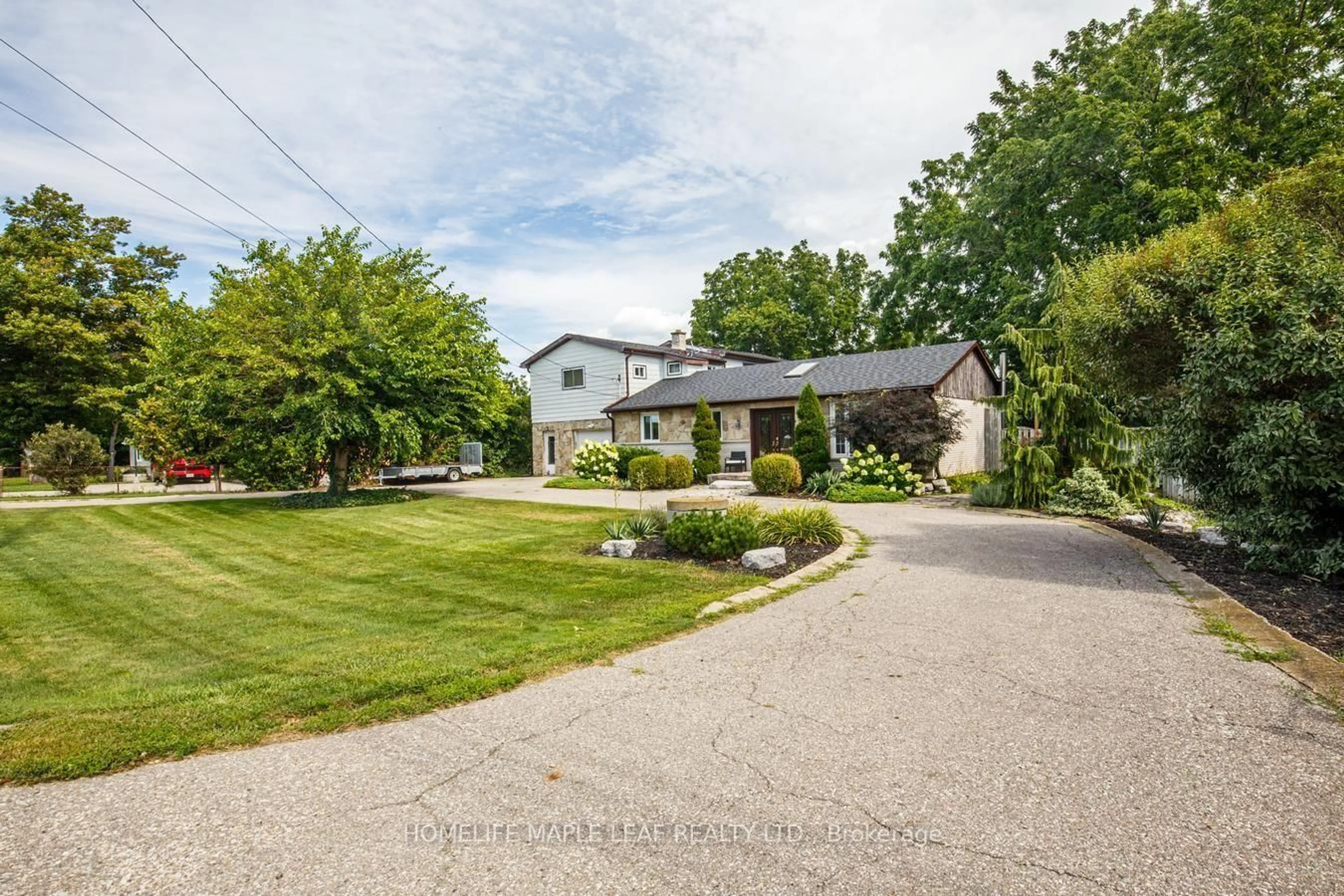 A pic from outside/outdoor area/front of a property/back of a property/a pic from drone, street for 7820 5 Sdrd, Milton Ontario L9T 7K7