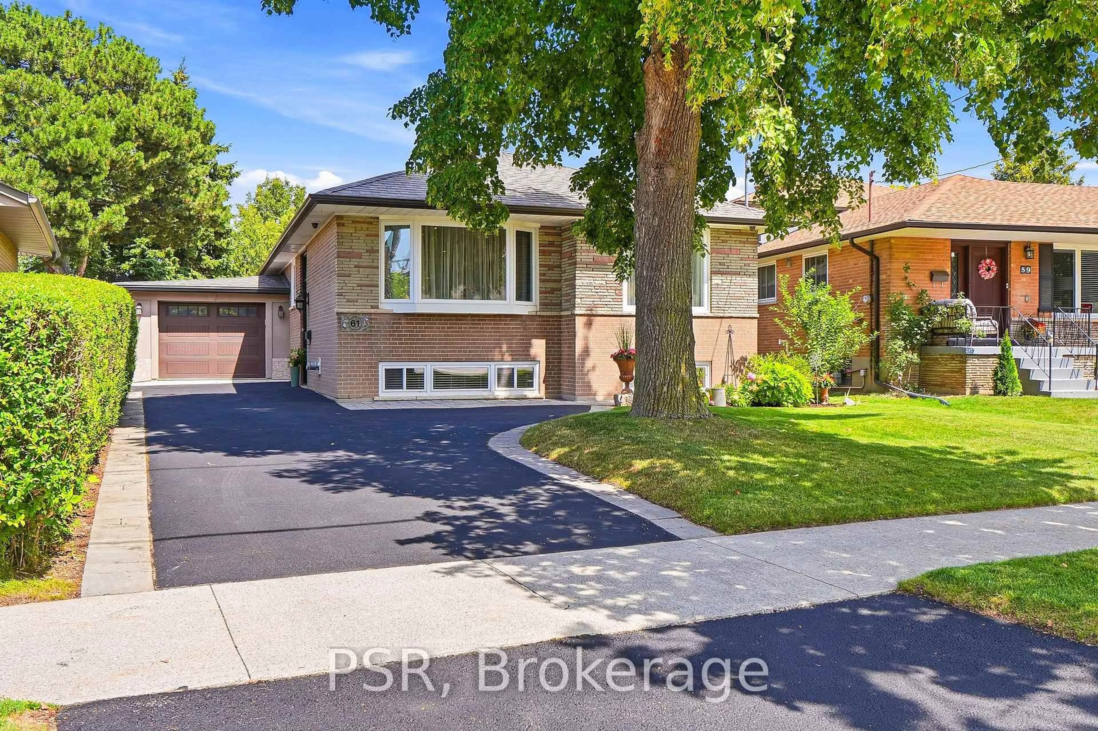 Home with brick exterior material, street for 61 Robinglade Dr, Toronto Ontario M9B 2R2