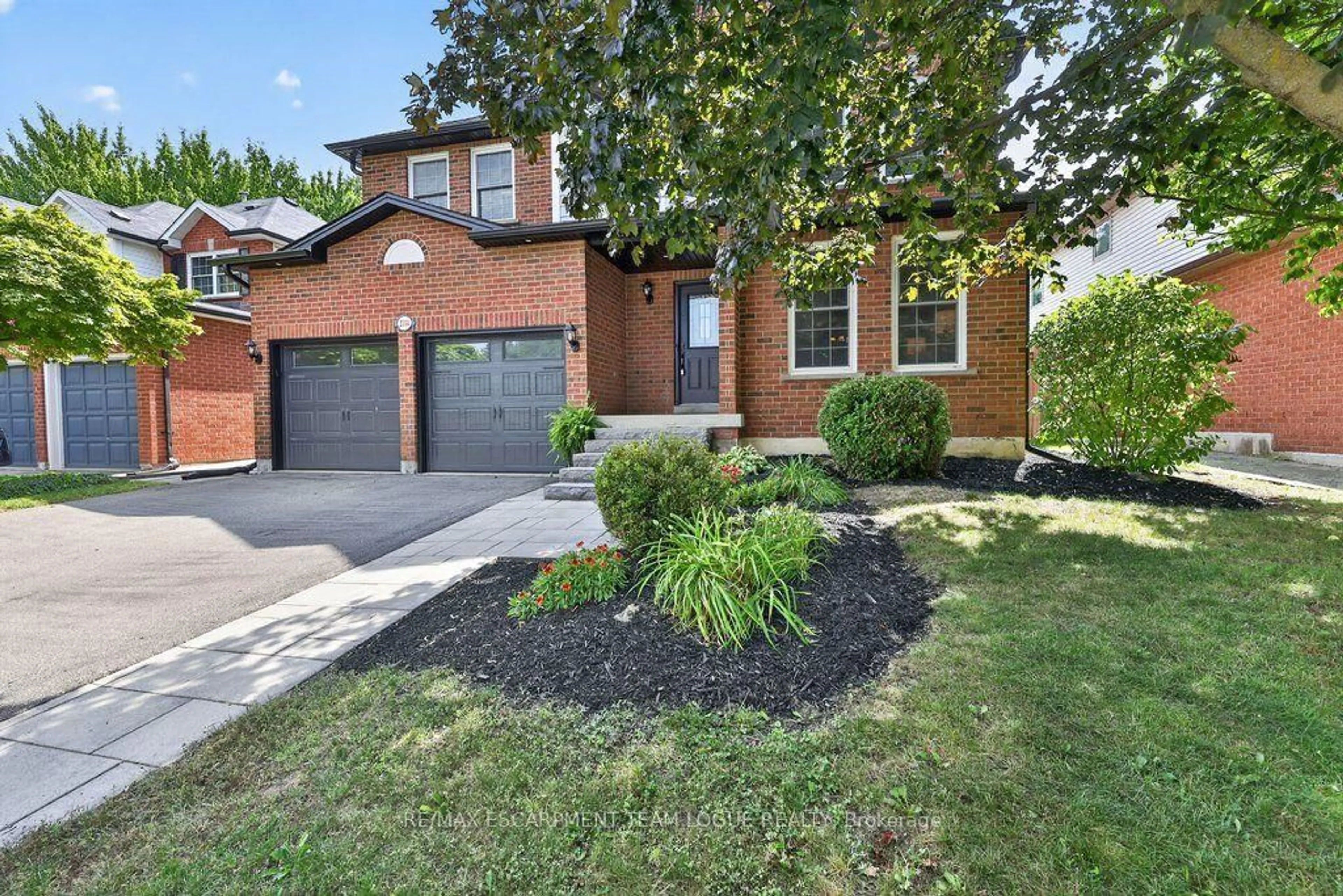 Home with brick exterior material, street for 2114 Country Club Dr, Burlington Ontario L7M 4A5