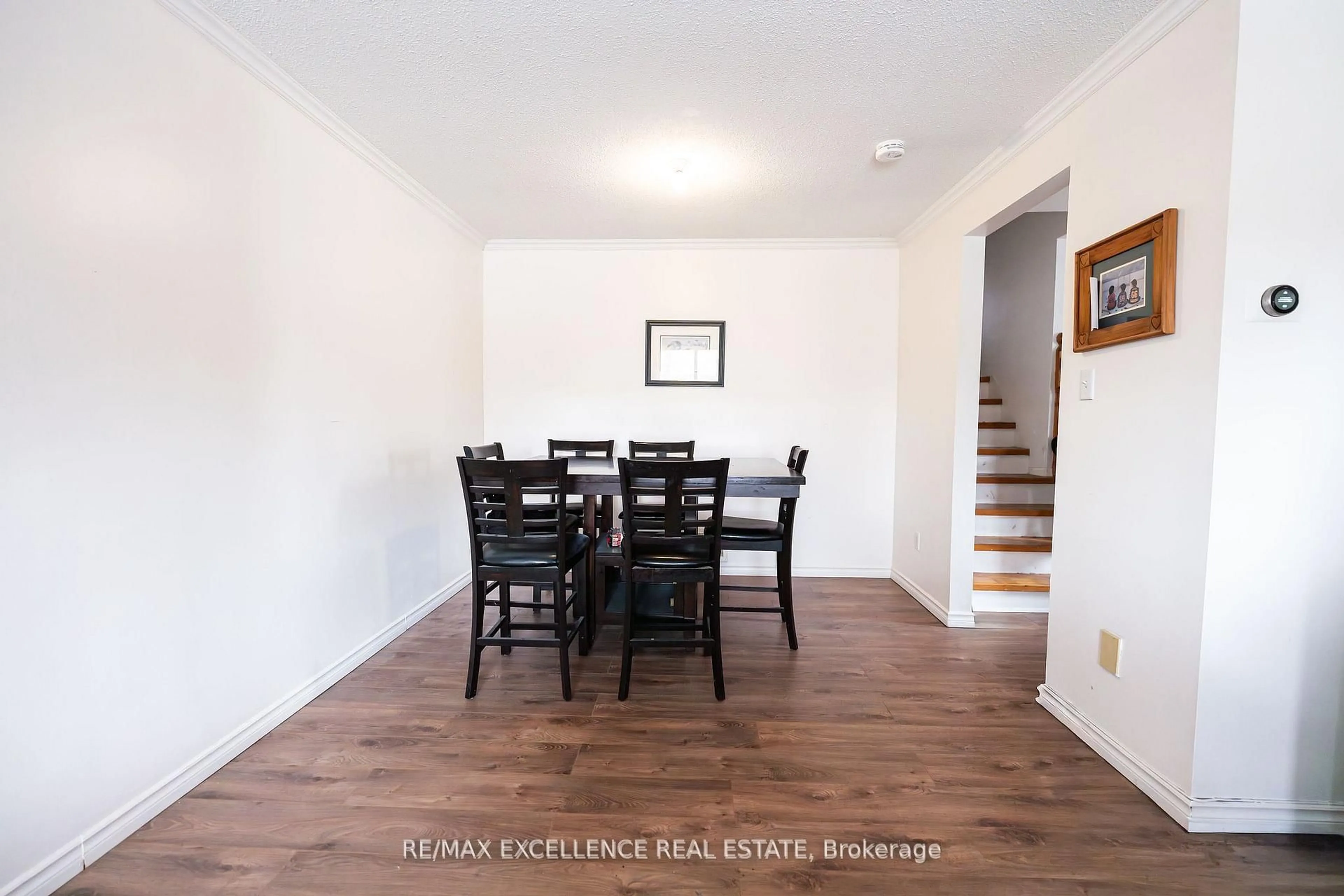 Dining room, wood/laminate floor for 144 Abell Dr, Brampton Ontario L6V 2Z8