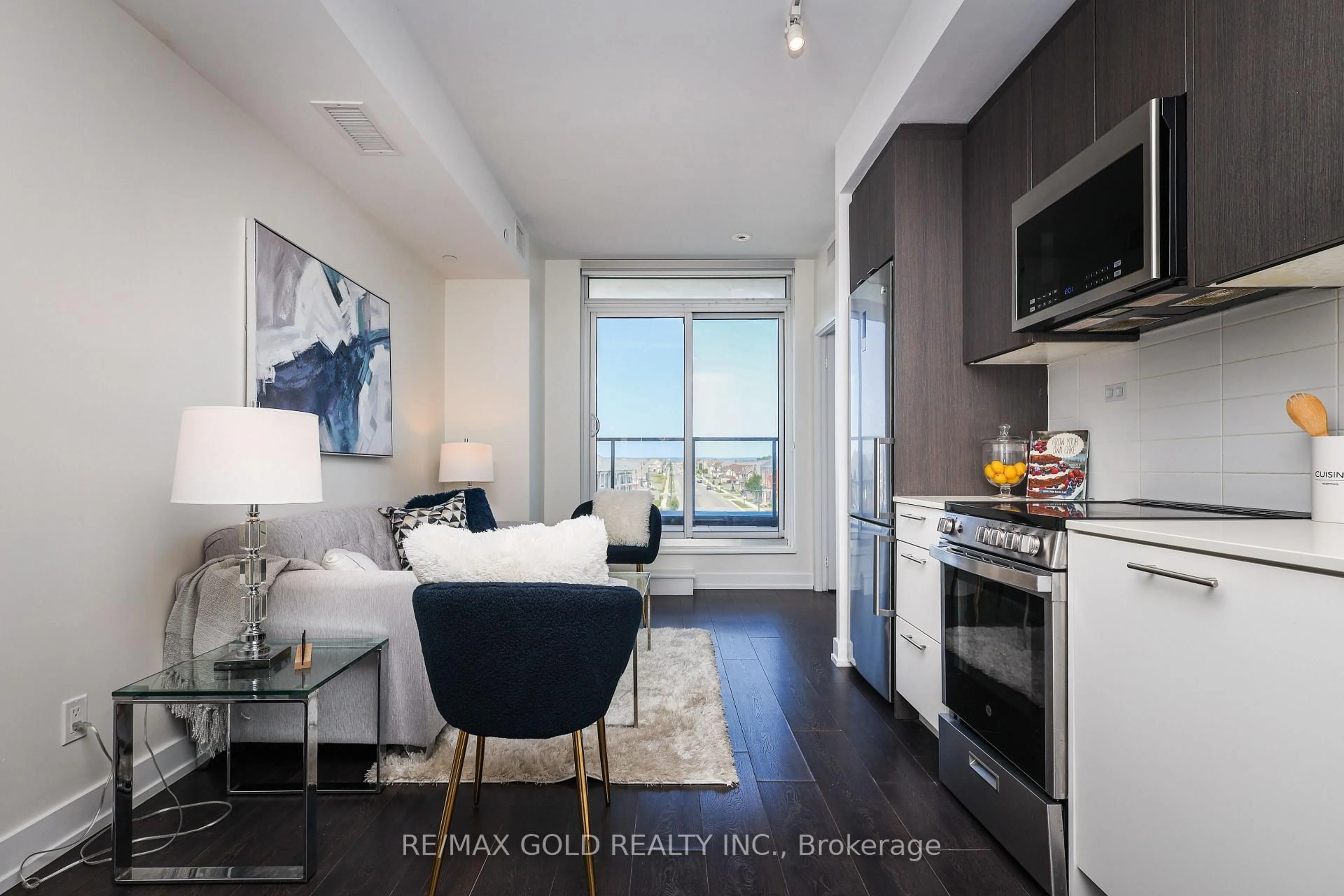 Open concept kitchen, wood/laminate floor for 225 veterans Dr #408, Brampton Ontario L7A 5L7